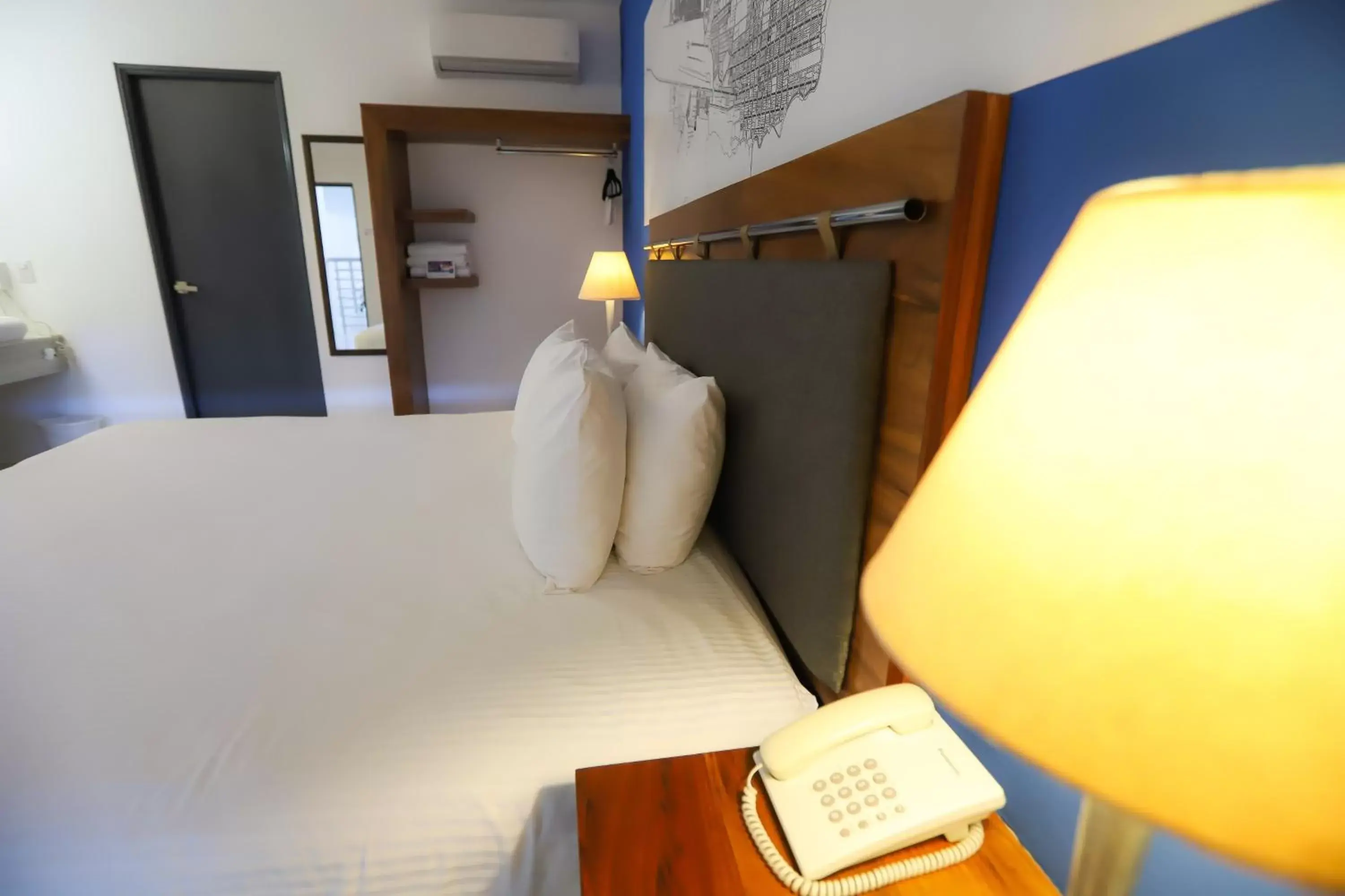 towels, Bed in TRYP by Wyndham Chetumal