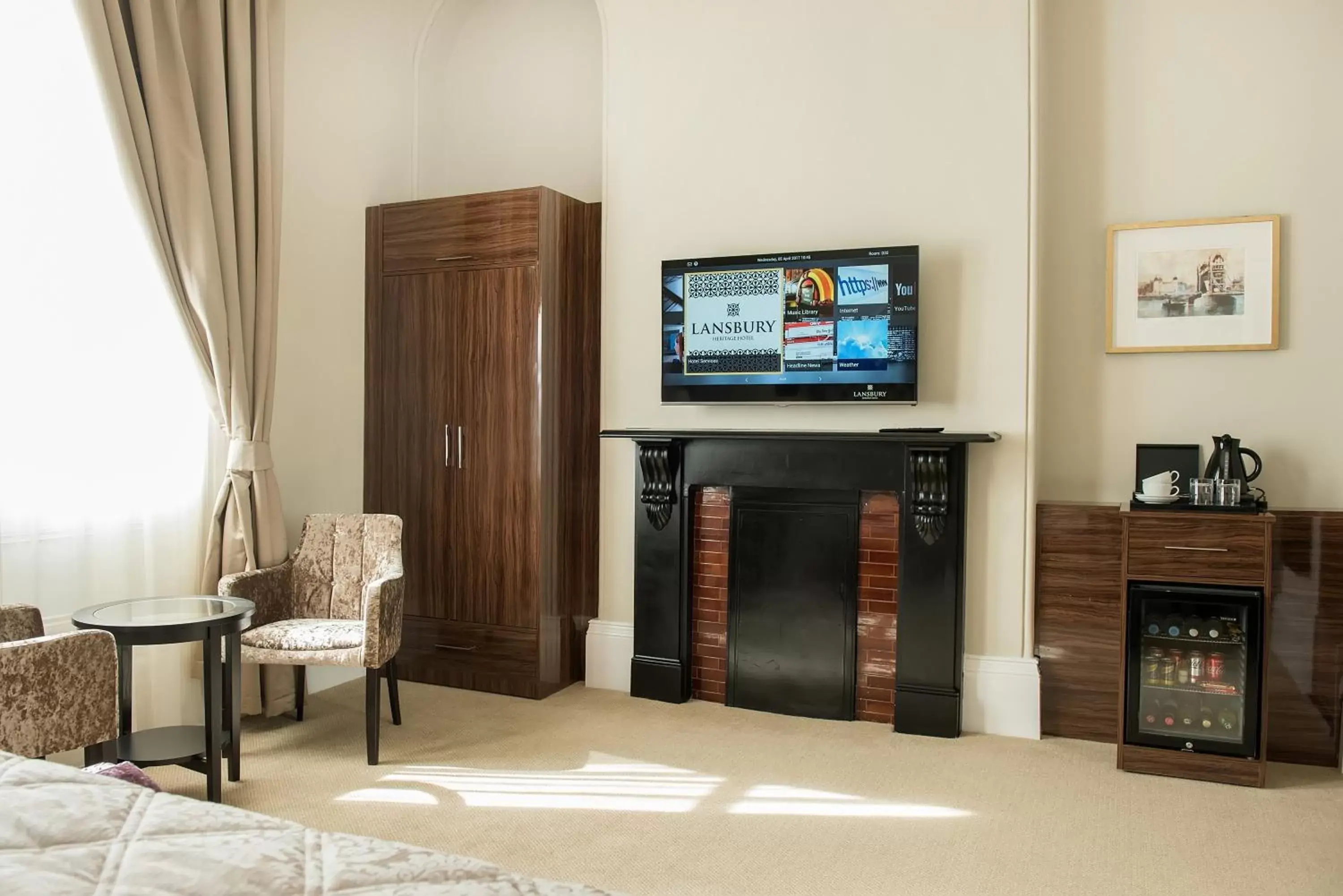 TV and multimedia, TV/Entertainment Center in Lansbury Heritage Hotel