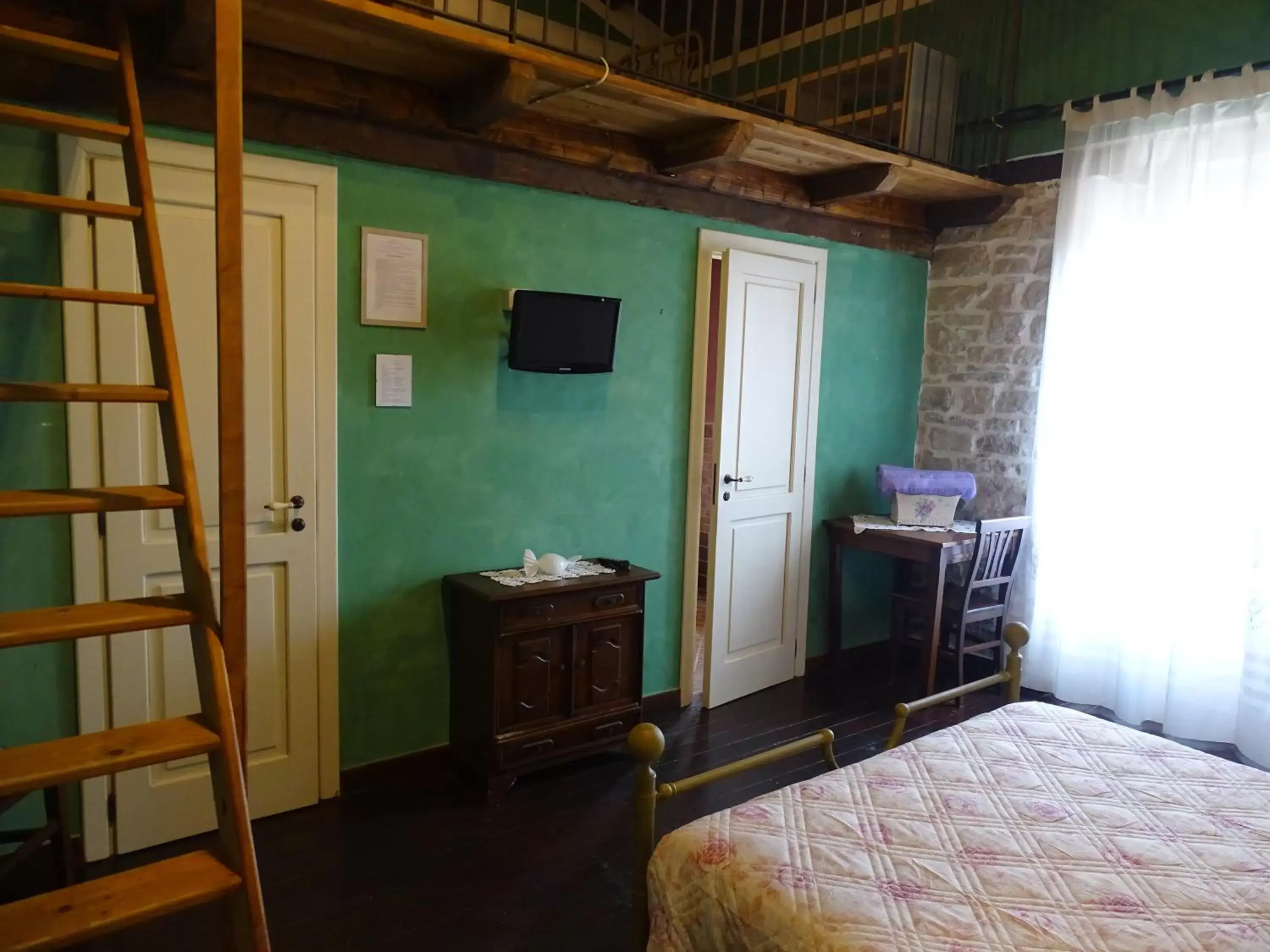 Bedroom, TV/Entertainment Center in Antica Taverna del Principe