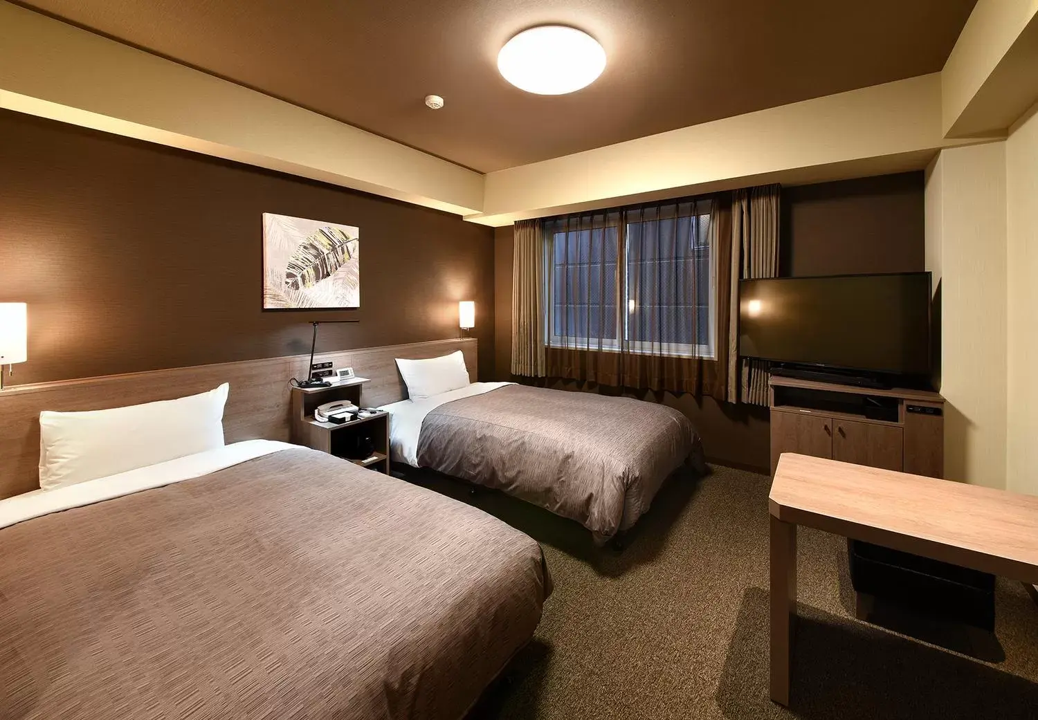 Bed in HOTEL ROUTE-INN Kamiyamada Onsen