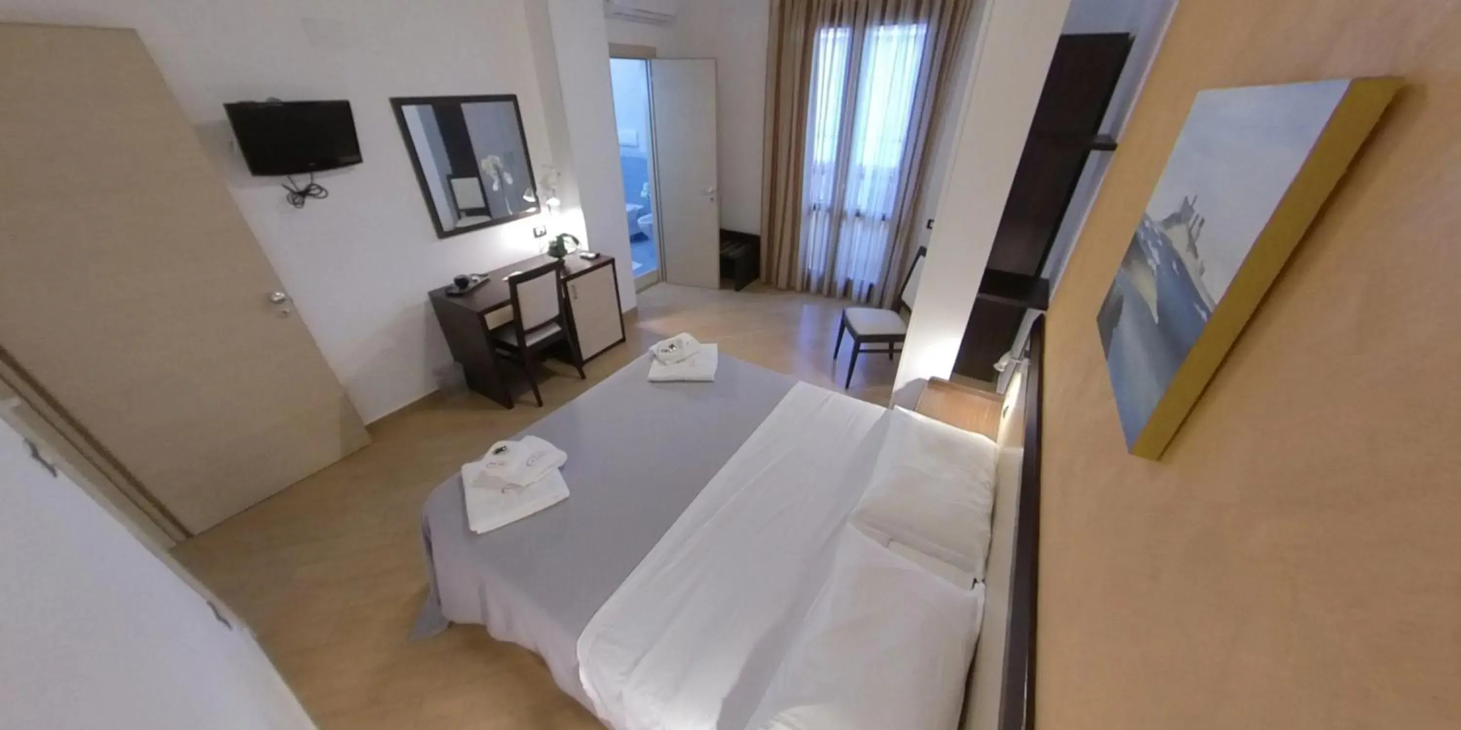 Bed in Albergo Perseo