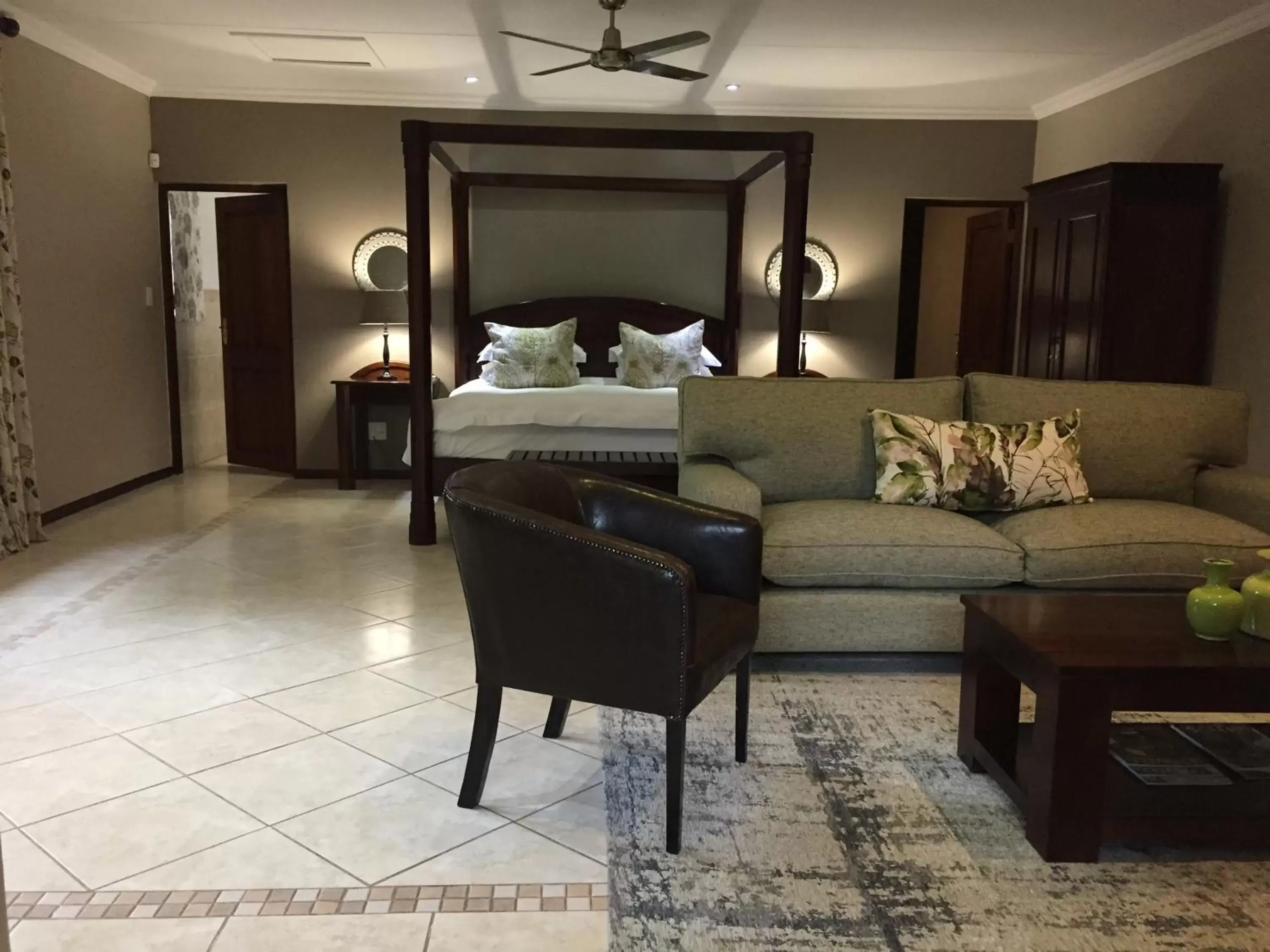 Bed, Seating Area in Nut Grove Manor Boutique Hotel