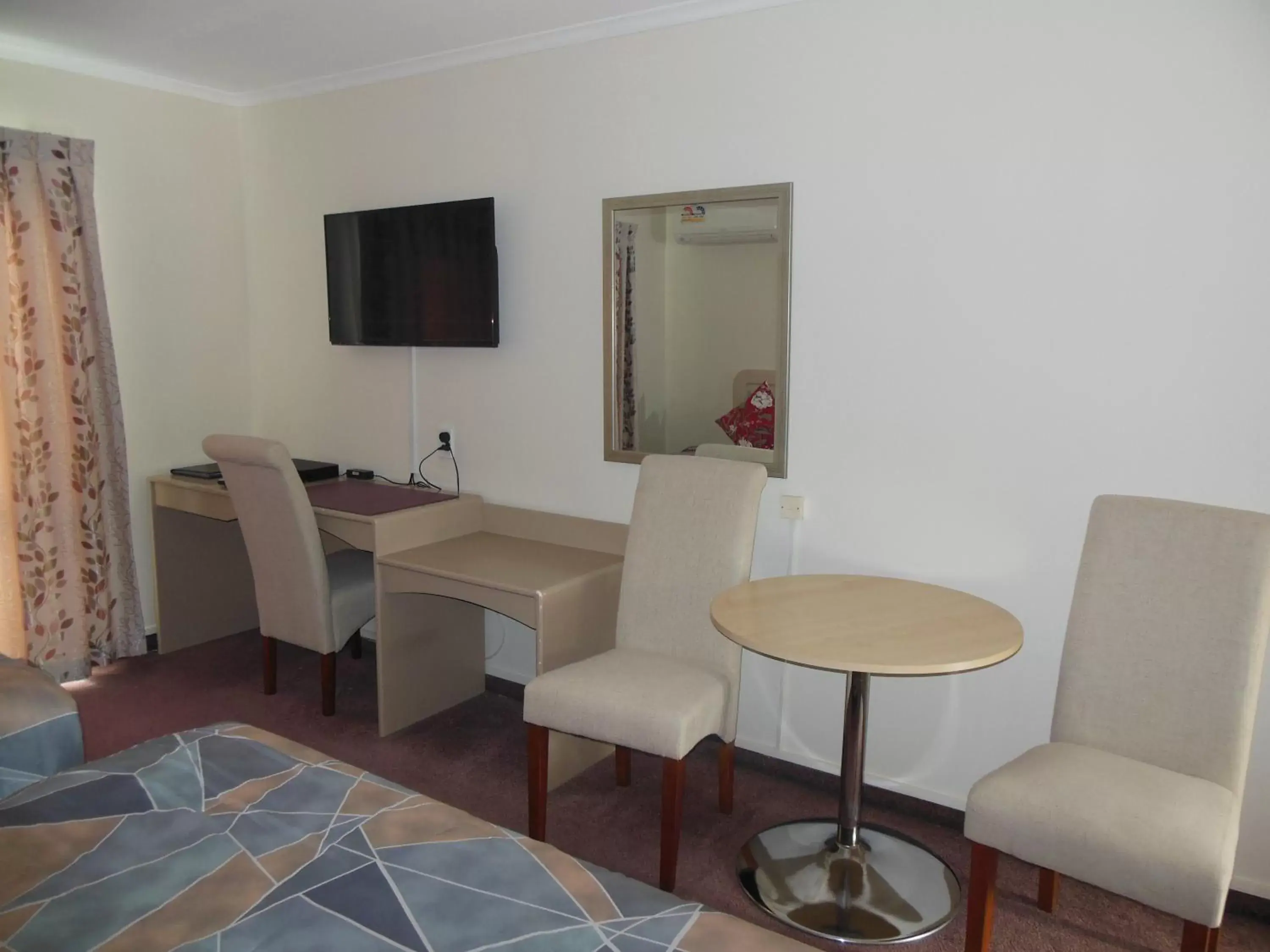 Living room in ASURE Camelot Arms Motor Lodge Living room in ASURE Camelot Arms Motor Lodge