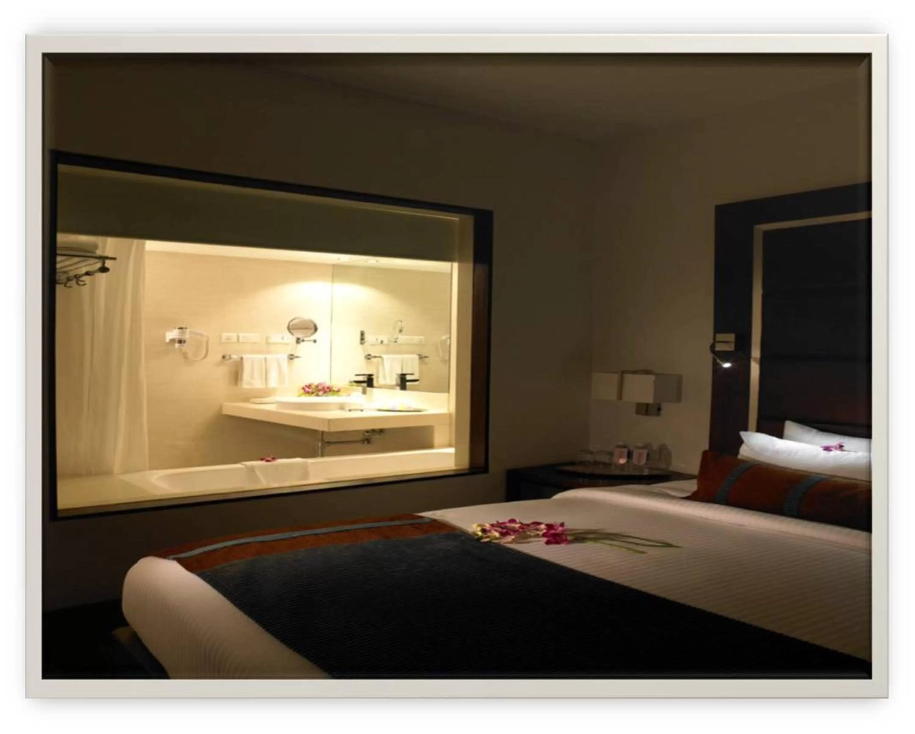 Bathroom, Bed in Royal Orchid Central, Pune