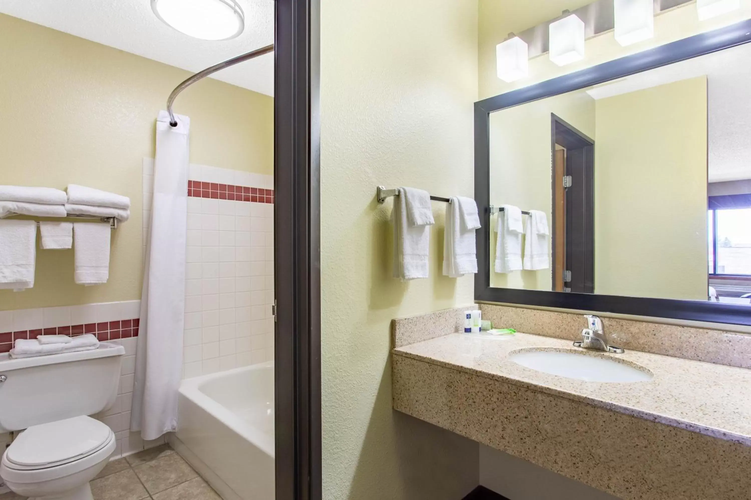 Bathroom in AmericInn by Wyndham Elkhorn Near Lake Geneva