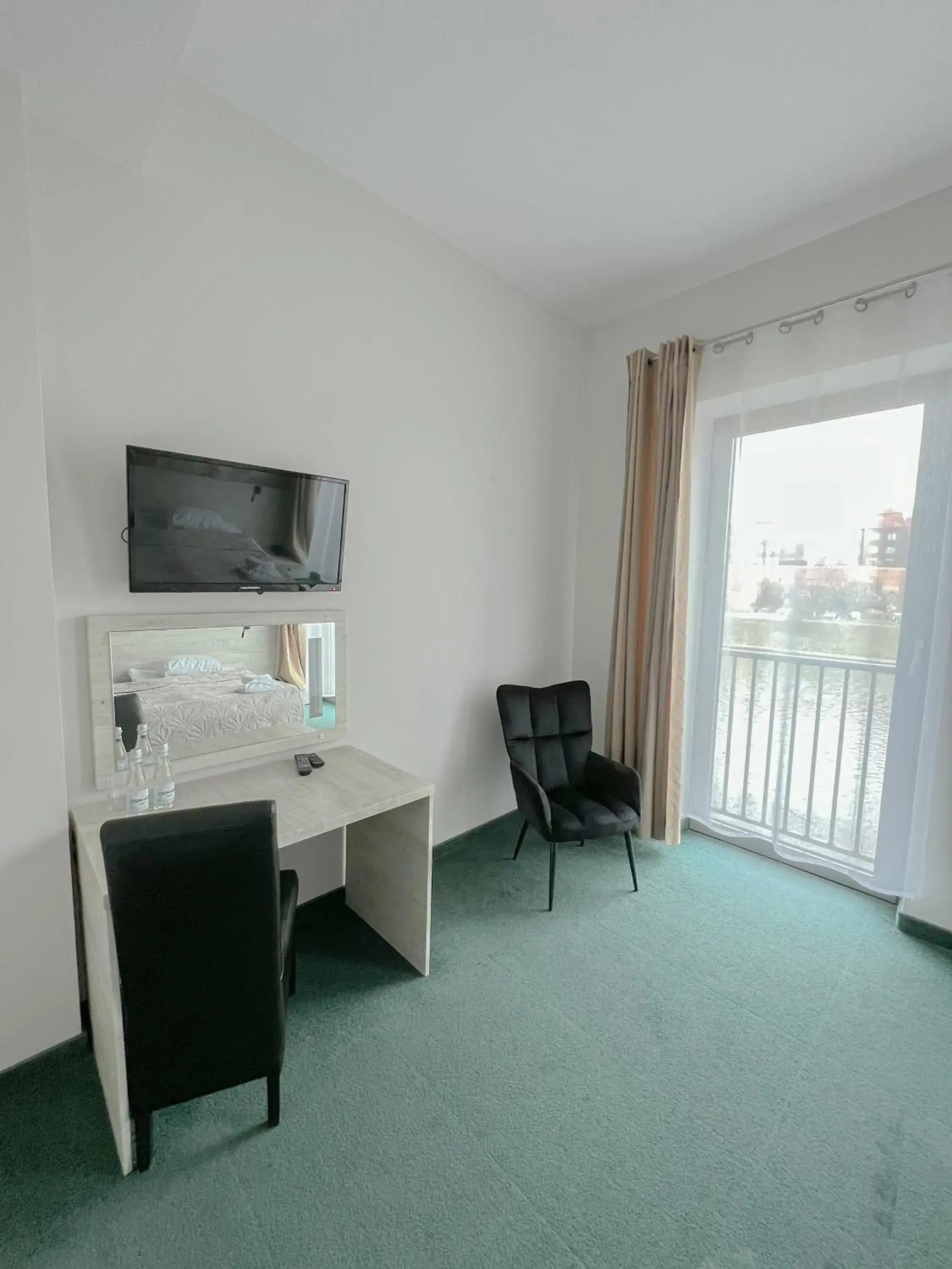 TV and multimedia, TV/Entertainment Center in Hotel Poleski