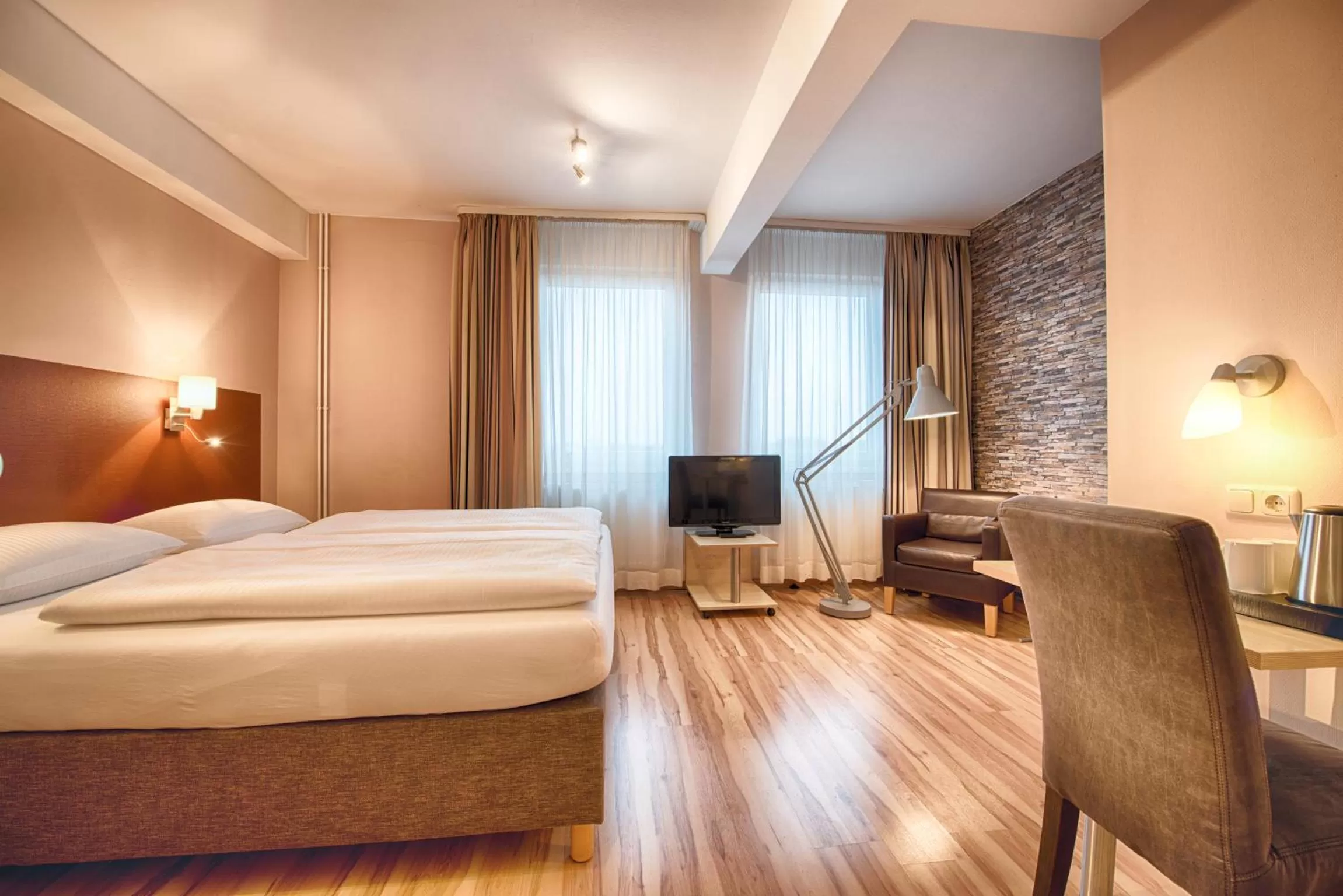 Photo of the whole room, Bed in enjoy hotel Berlin City Messe