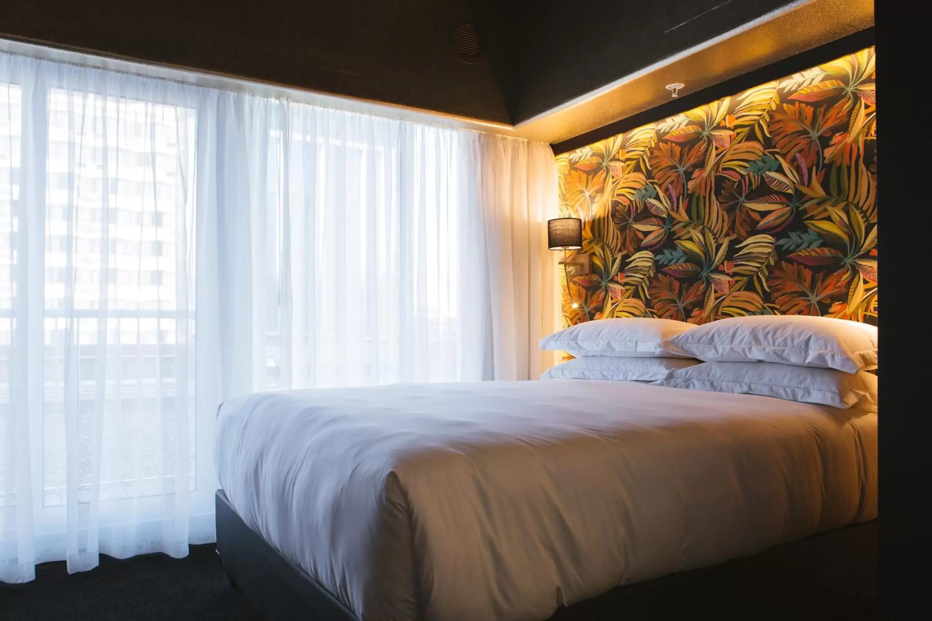 Bed in Signature Lux Hotel by ONOMO, Foreshore