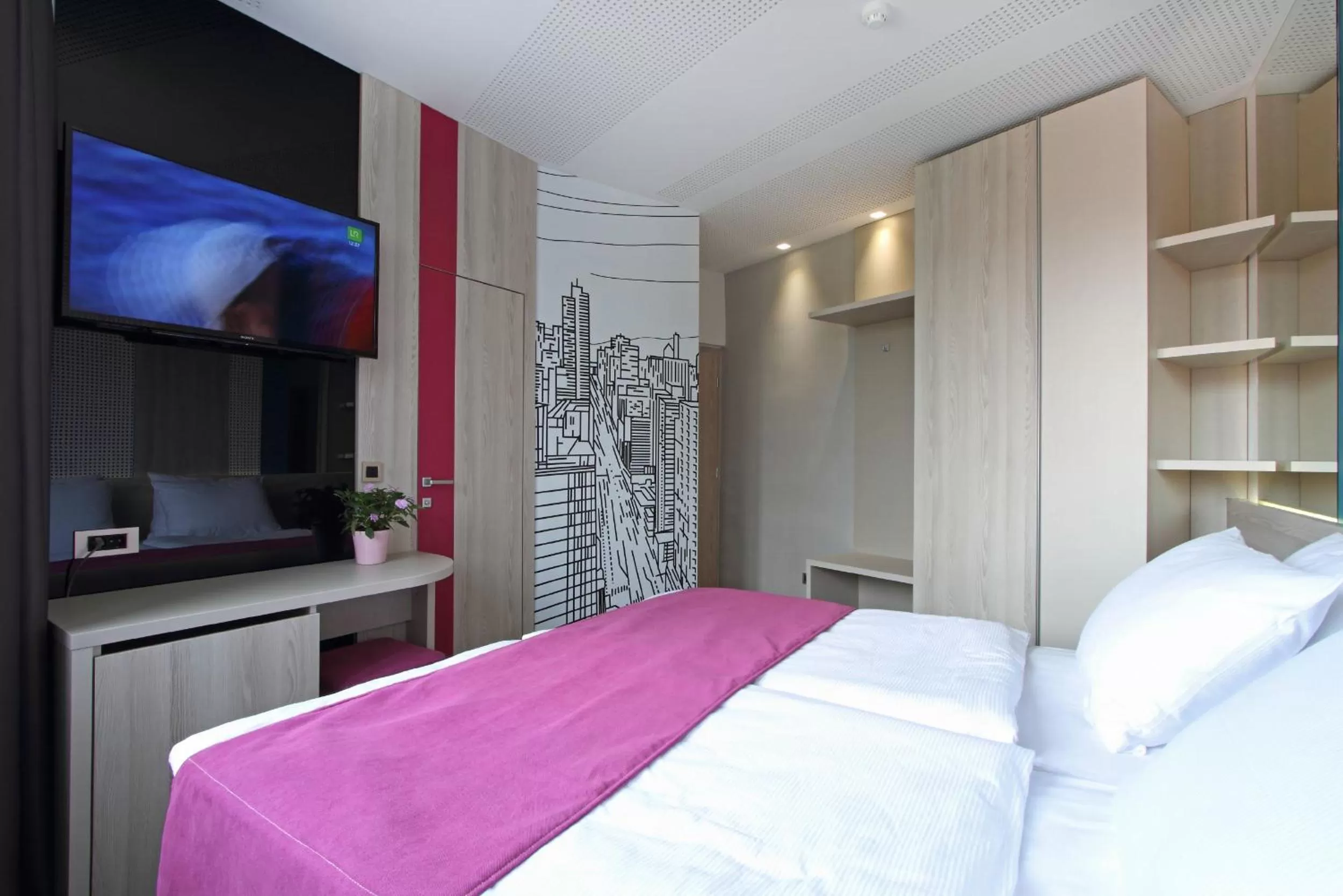 Bed in Hotel Cosmopolit