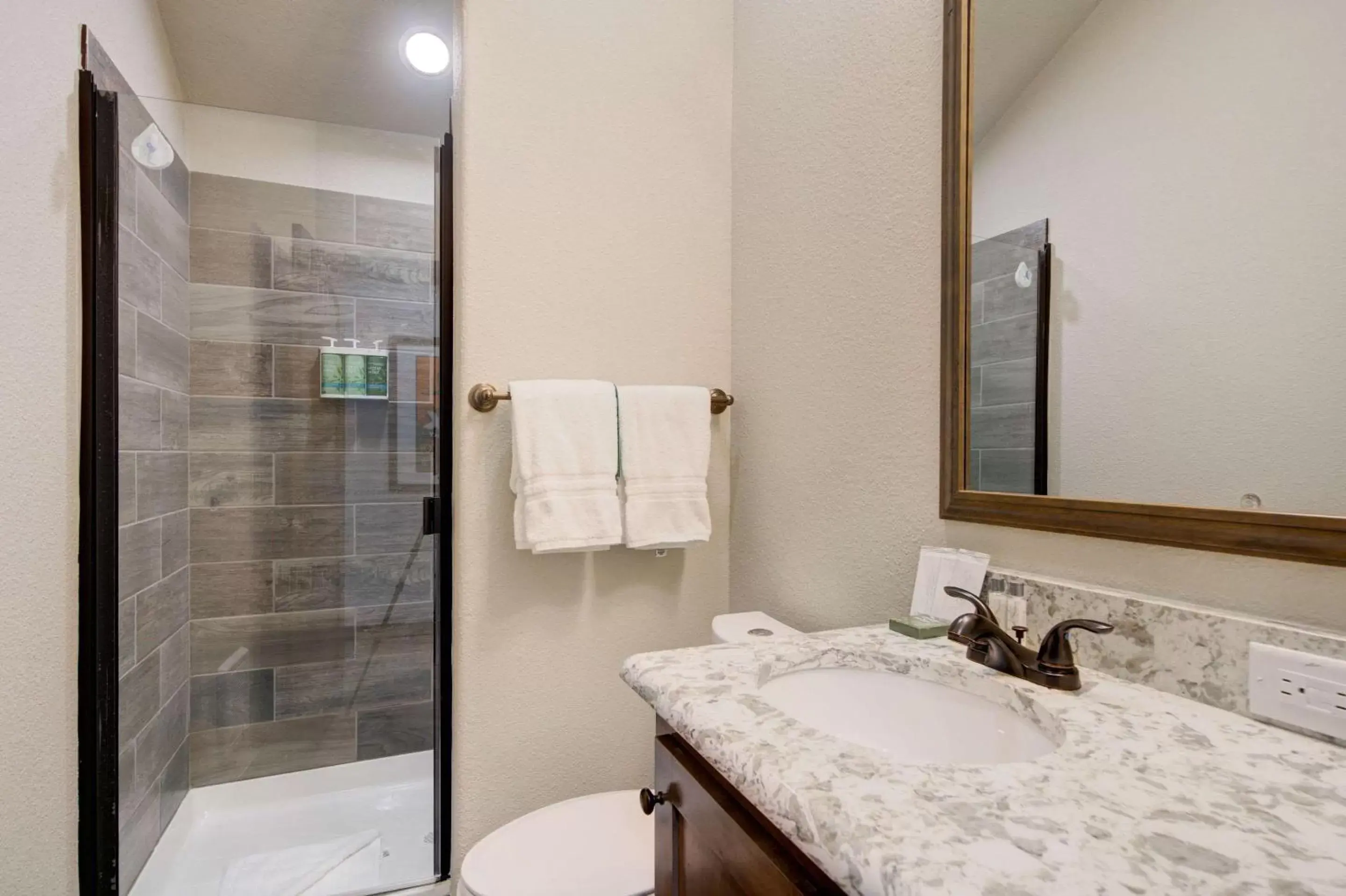 Bedroom, Bathroom in The Ridgeline Hotel at Yellowstone, Ascend Hotel Collection