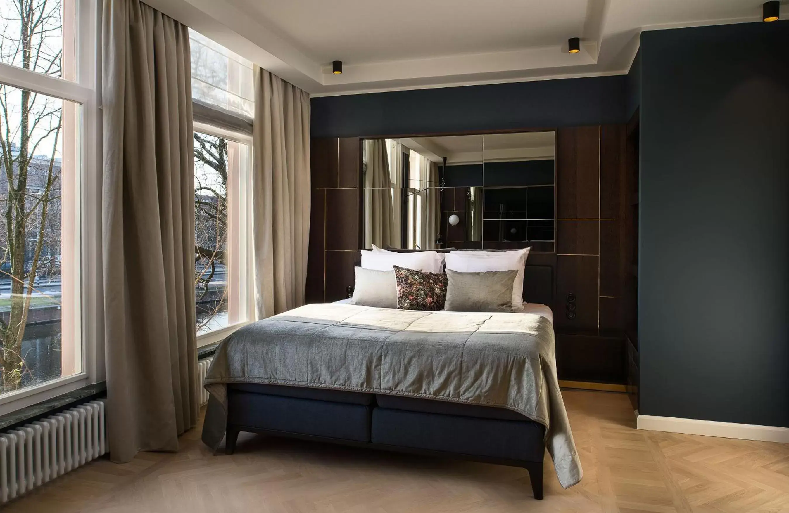 Bed in Spinoza Suites