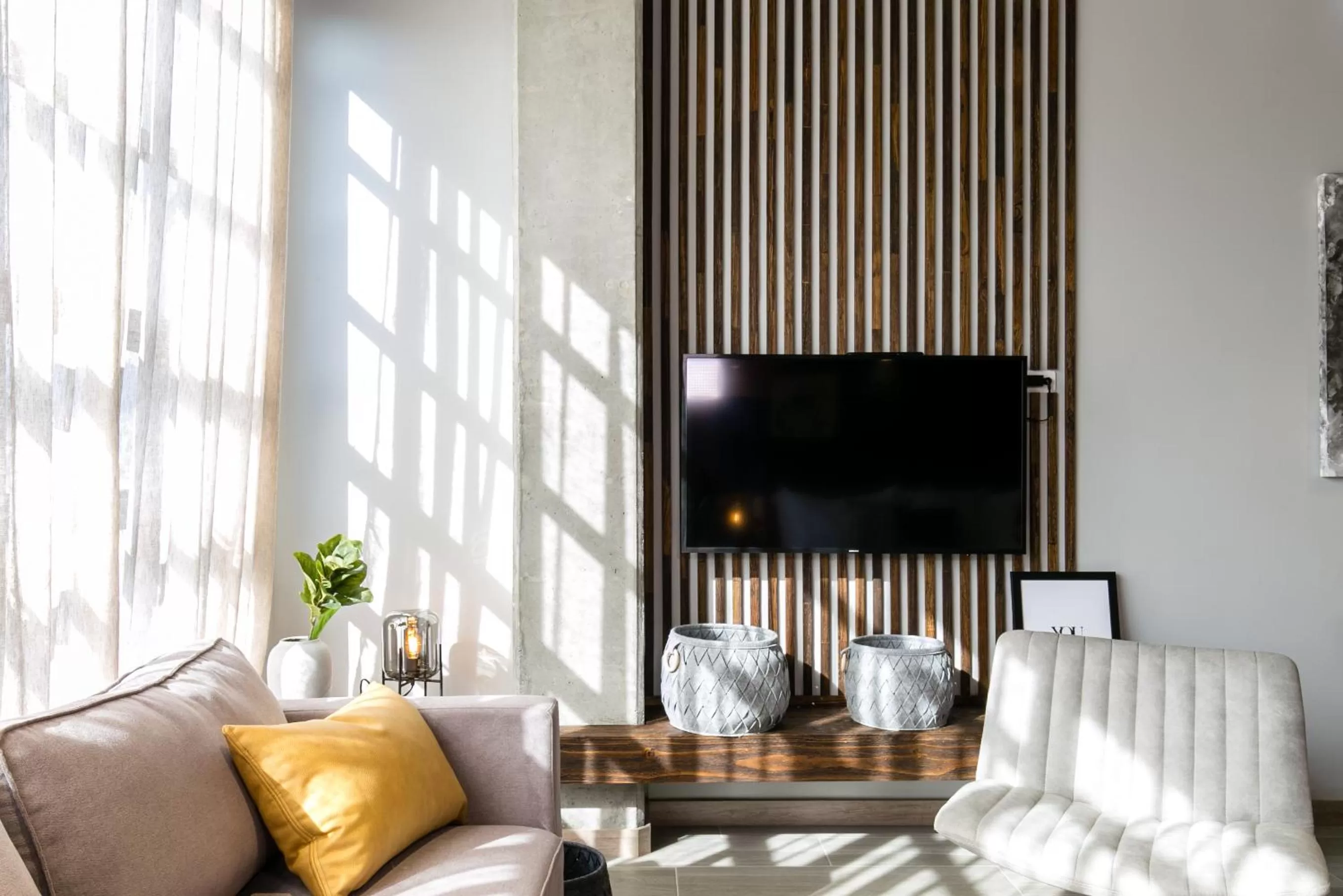 Communal lounge/ TV room in Factory Lofts Hotel