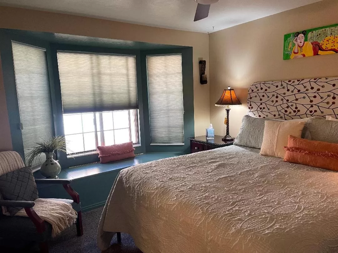 Bed in Harvest House Bed and Breakfast