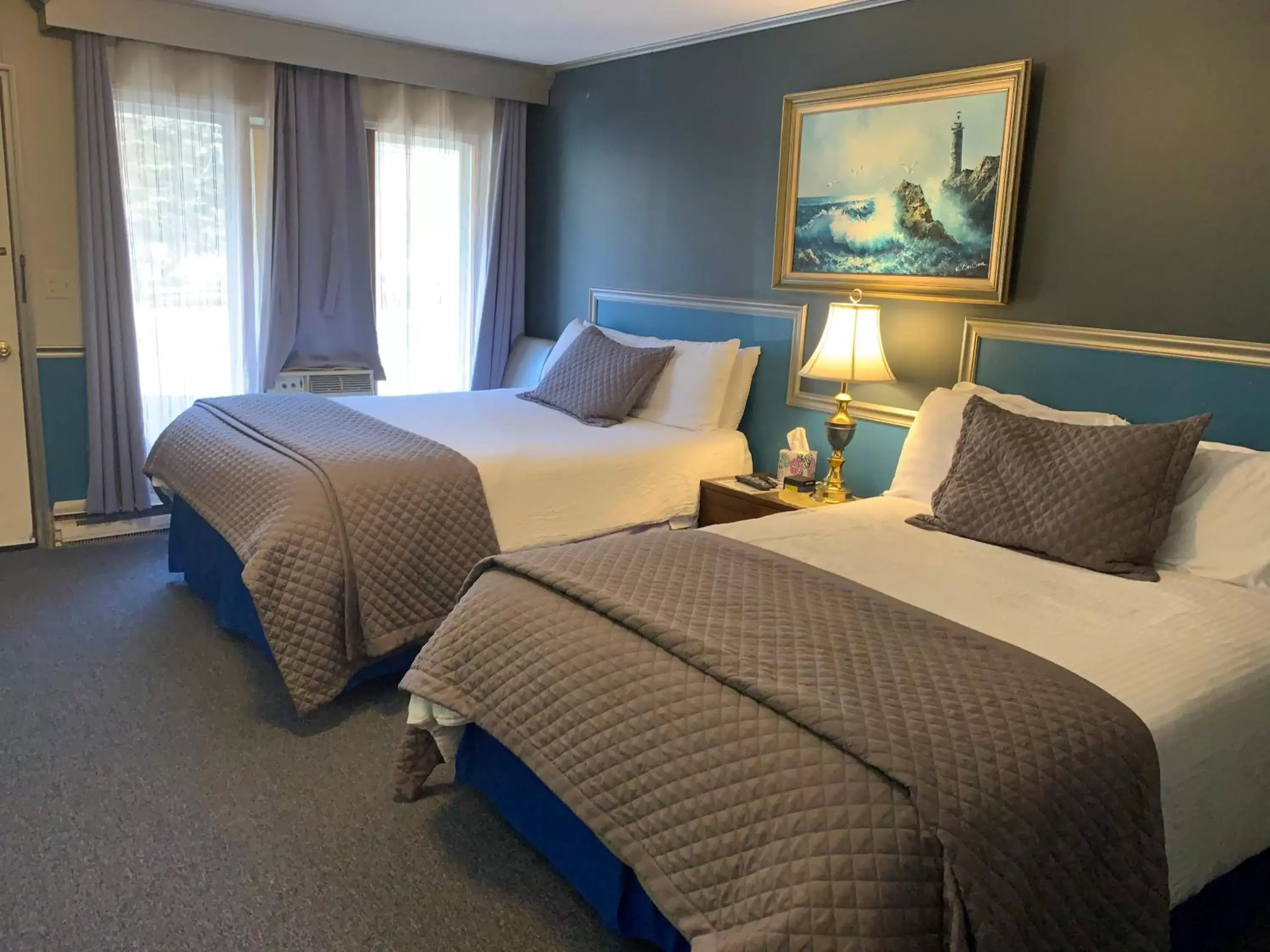 Bed in Starlite Motel & Suites