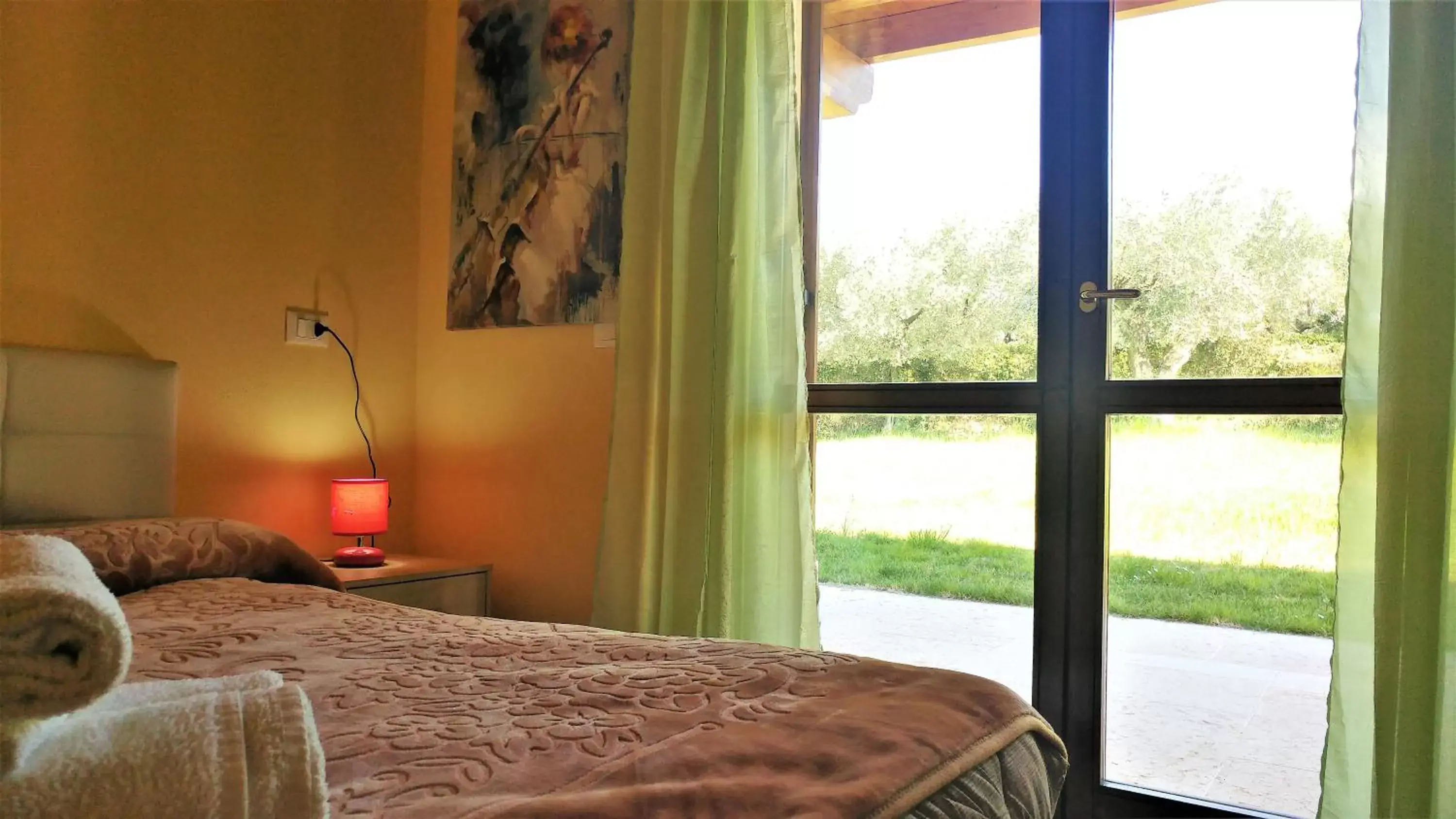 Photo of the whole room, Bed in AGRITURISMO MELOGRANO D'ORO