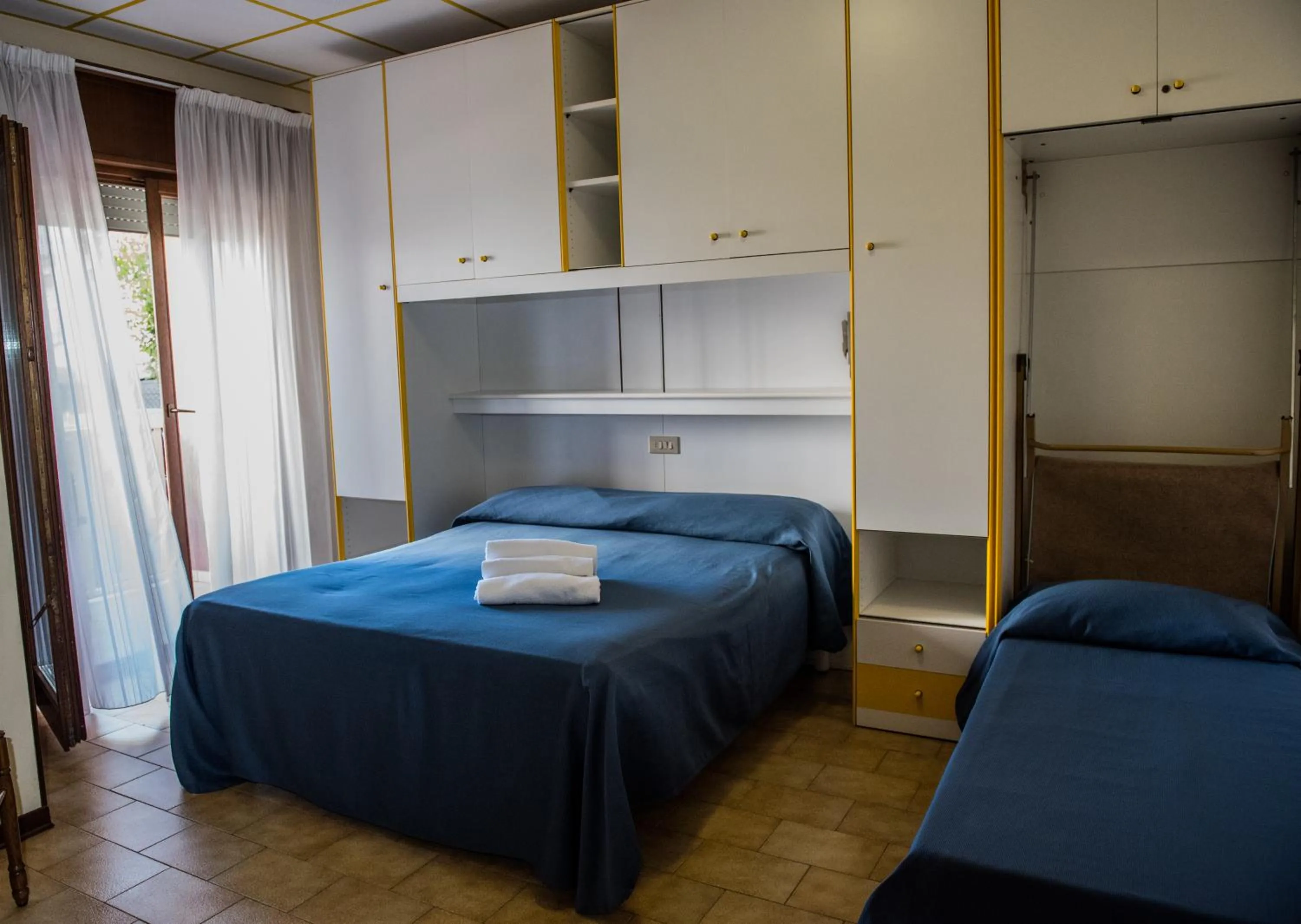 Bed in Hotel Malibran