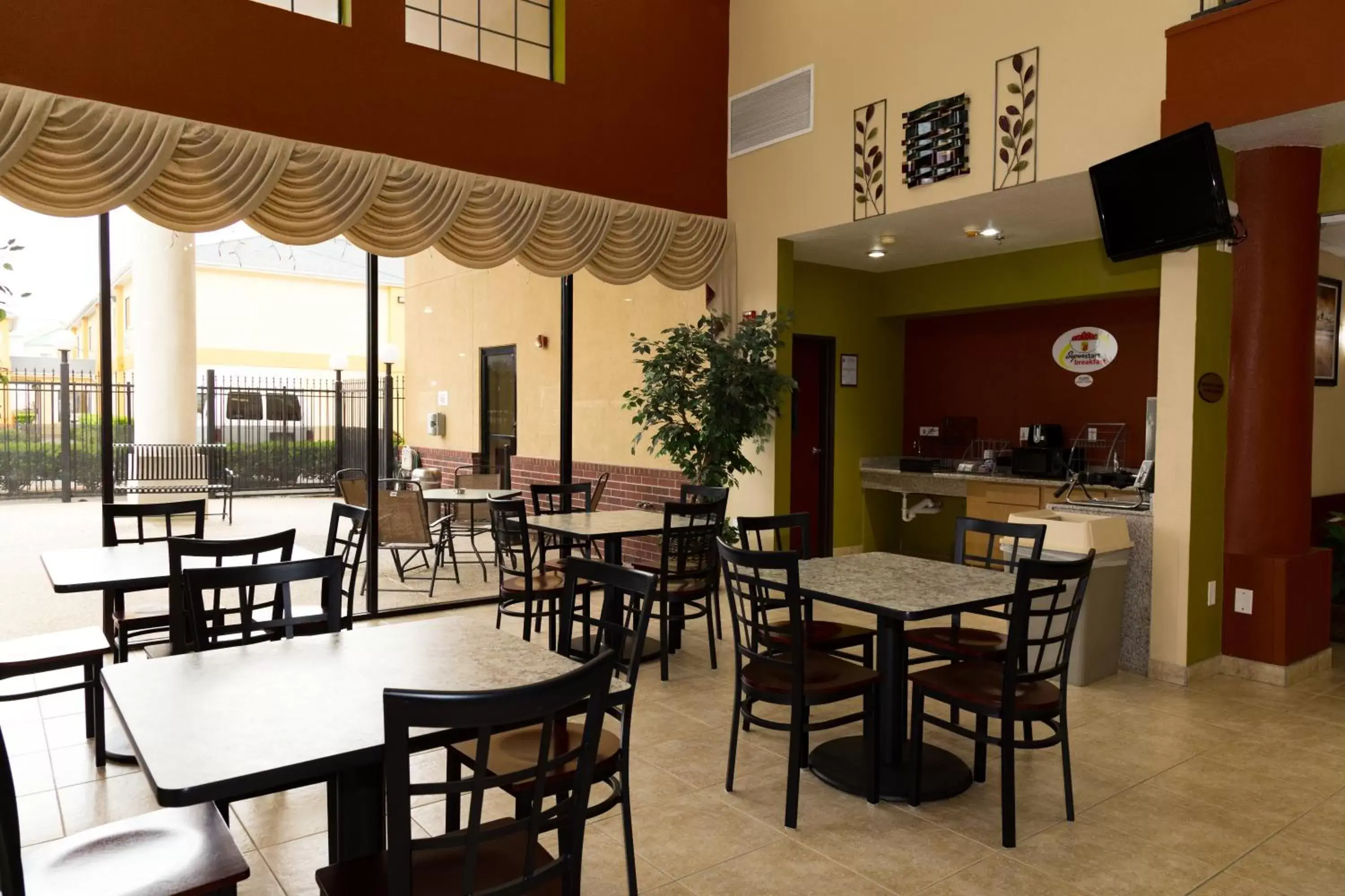 Lobby or reception, Restaurant/Places to Eat in Super 8 by Wyndham Intercontinental Houston TX