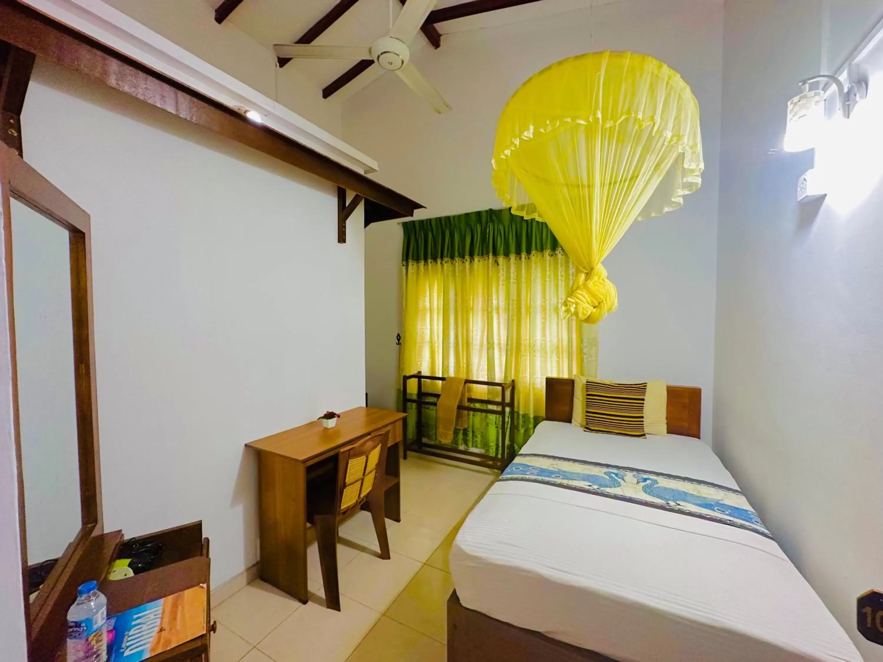 Budget Single Room in New Peacock Resort Budget Single Room in New Peacock Resort