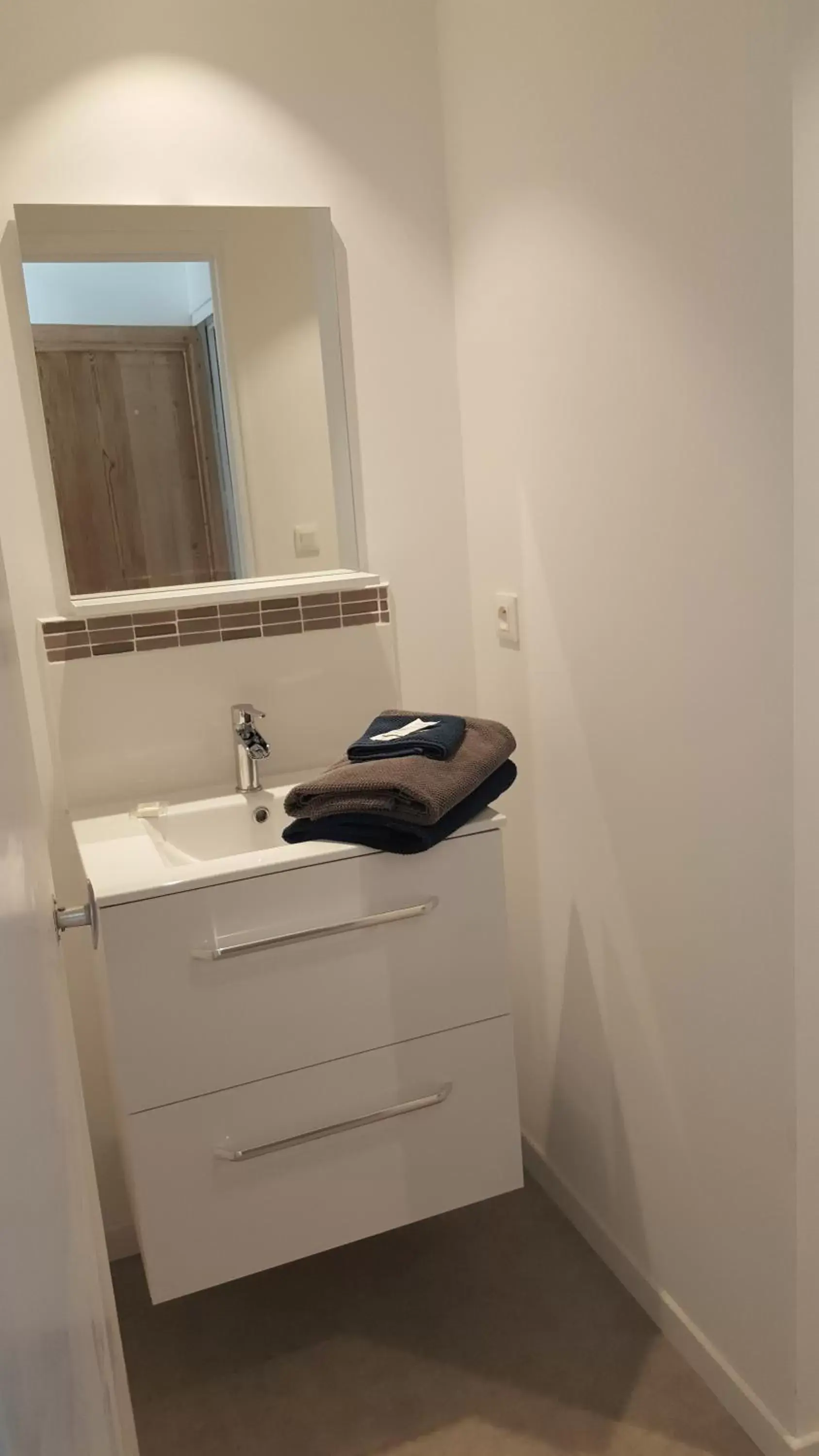 Bathroom in Le Mole (Appartements et Chambres)