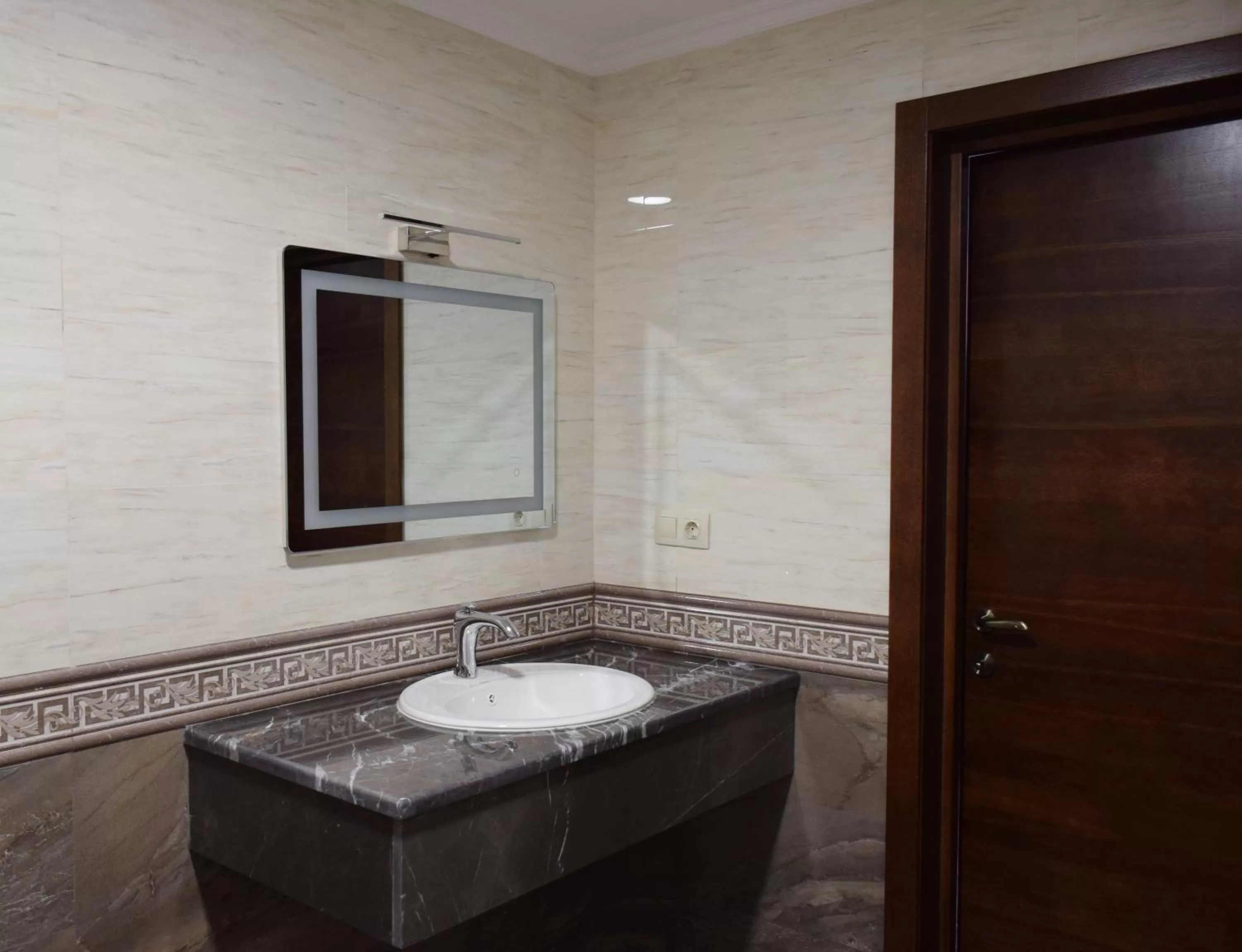 Bathroom in MirOtel Hotel