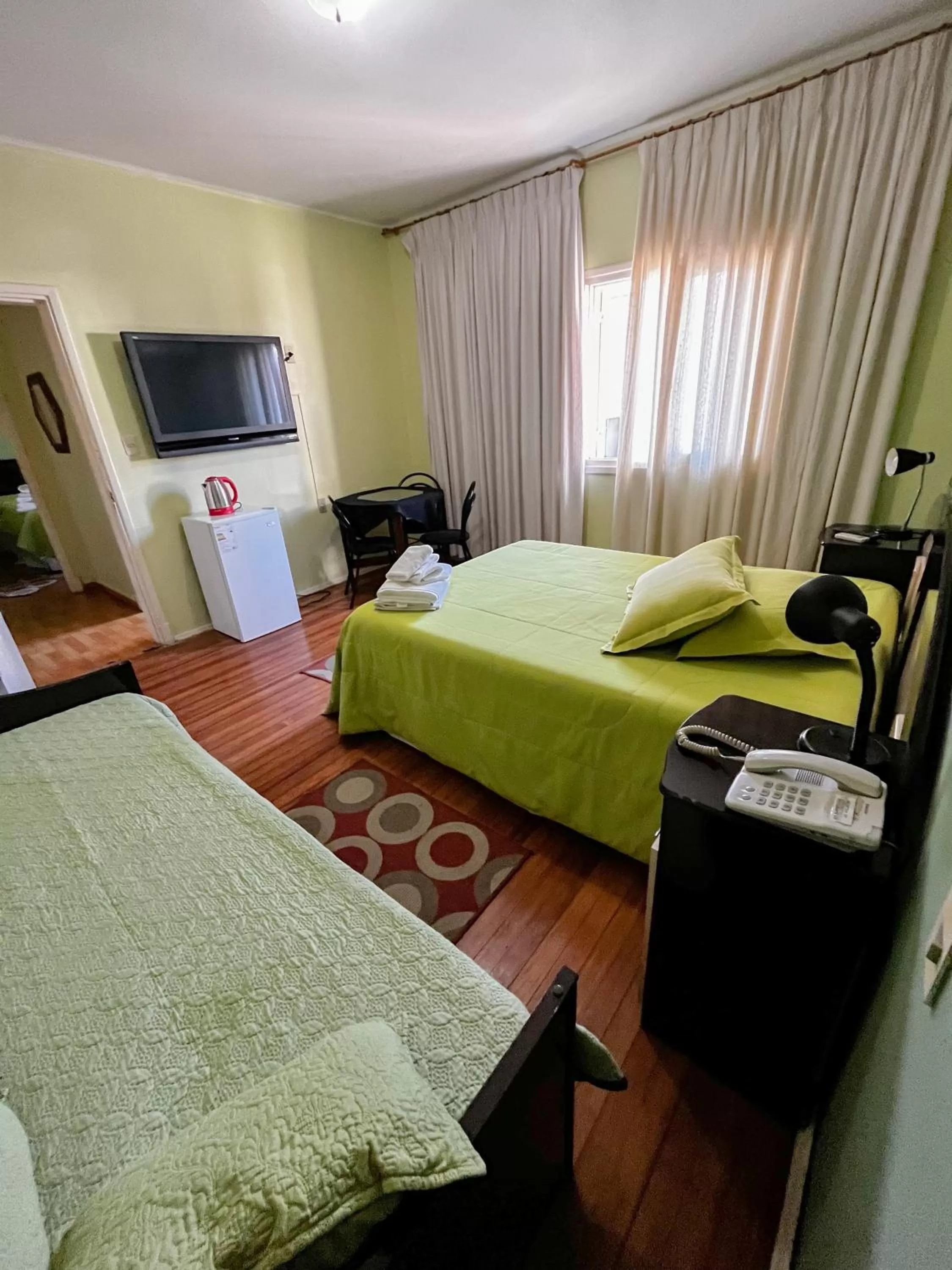 Bed in Hotel Uruguay Brasil