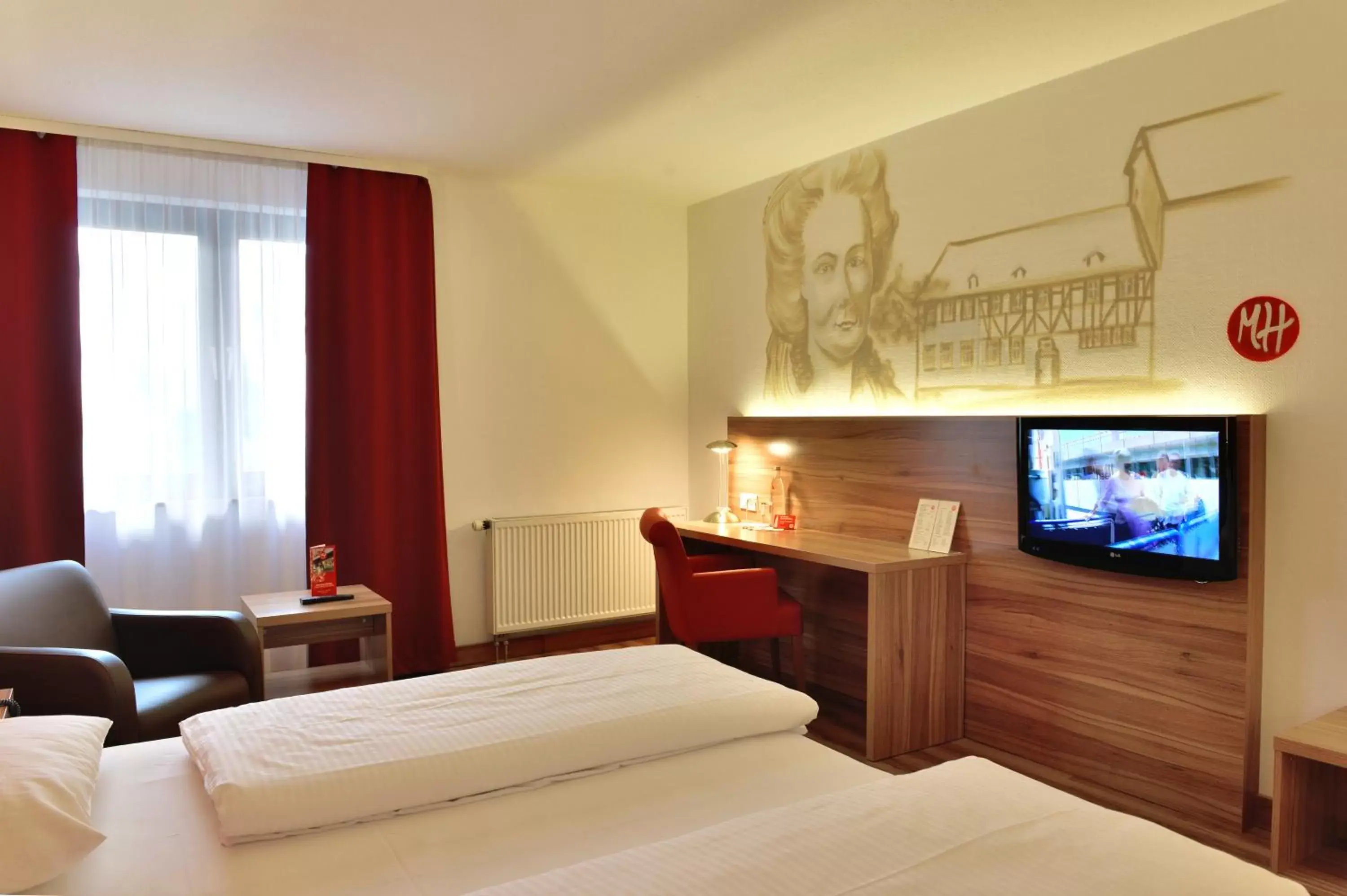 Photo of the whole room, Bed in ACHAT Hotel Wetzlar