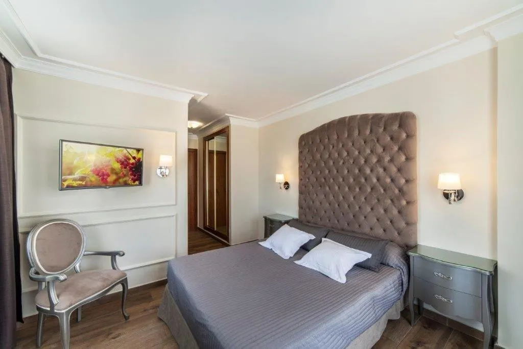 Bed in Essence Hotel Boutique