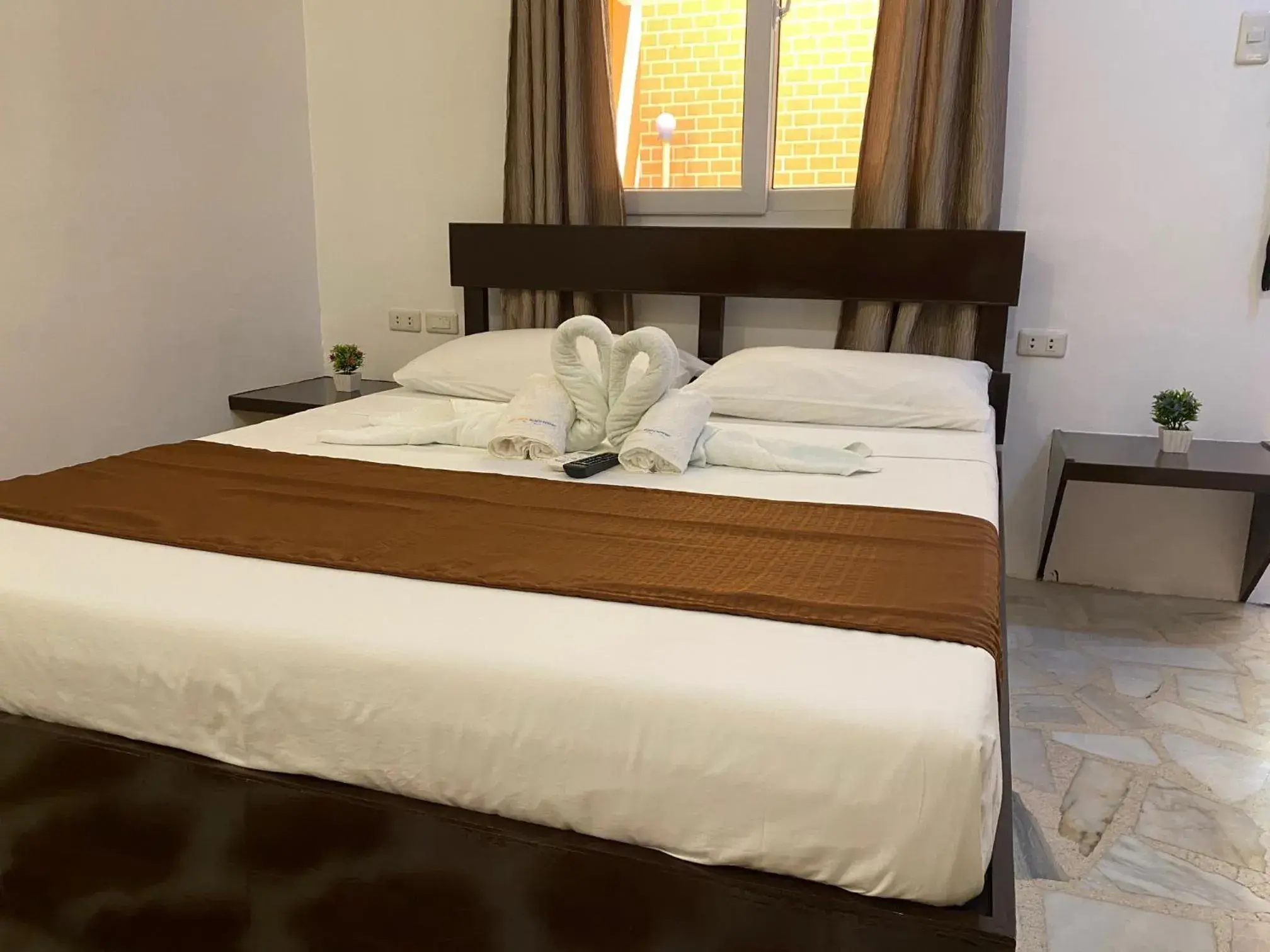 Bed in Papa Freds Beach Resort Bed in Papa Freds Beach Resort