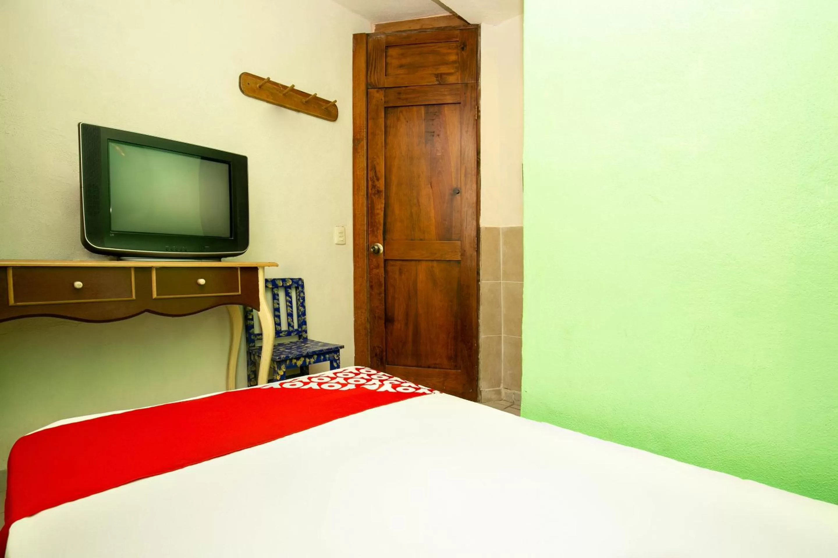 Bedroom in OYO La Casita