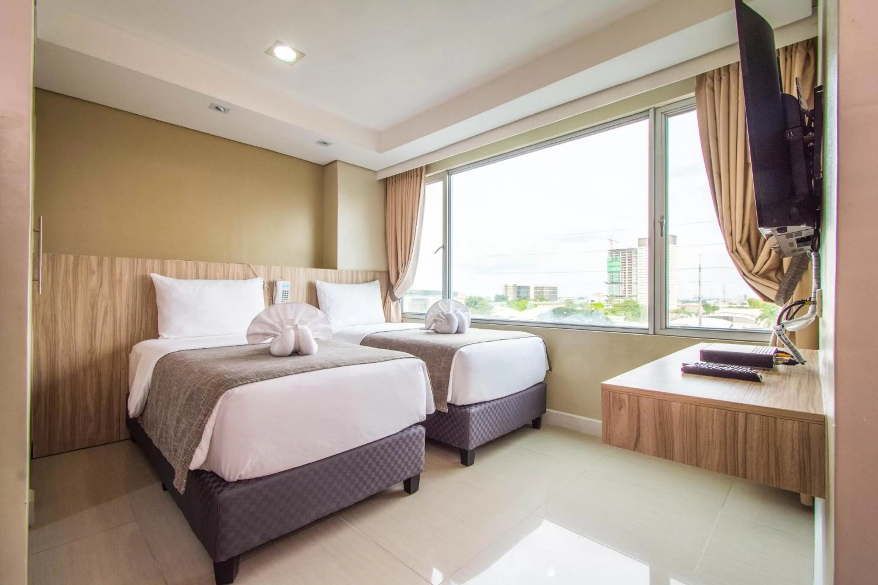 Bed in Alicia Apartelle