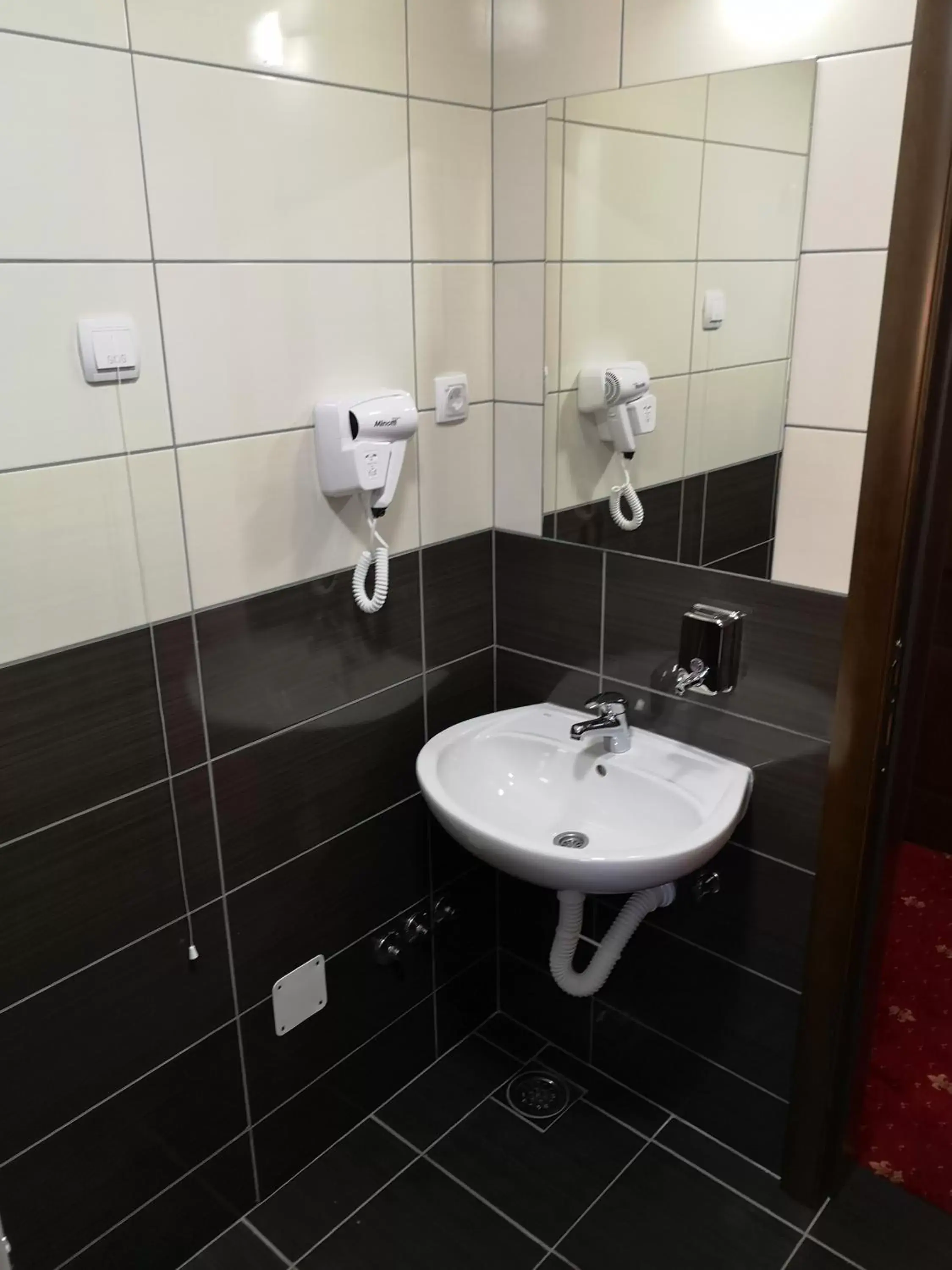 Bathroom in Hotel Elegance