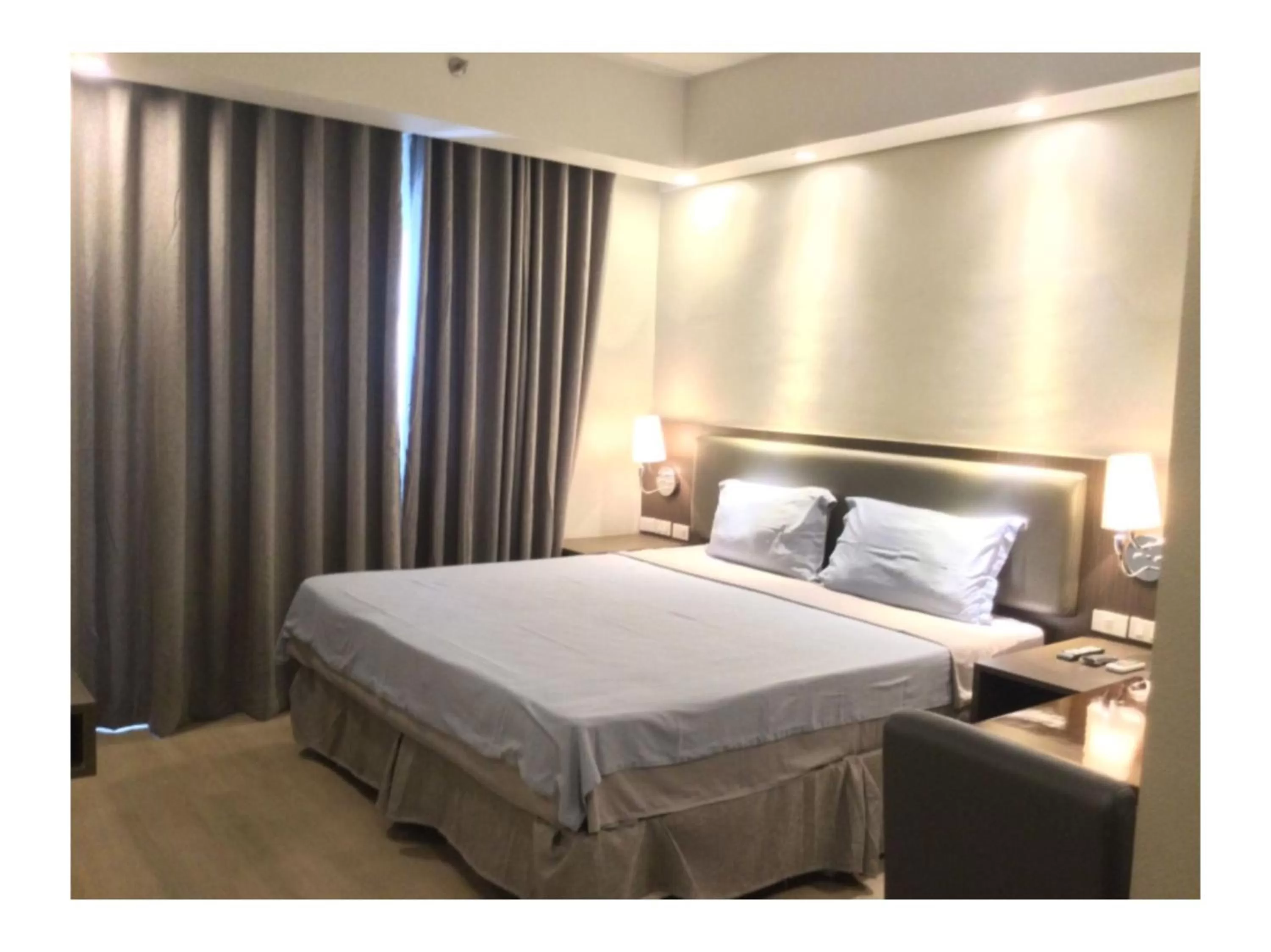 Bedroom, Bed in Capital O 804 The Residences at Bonifacio Civic Center