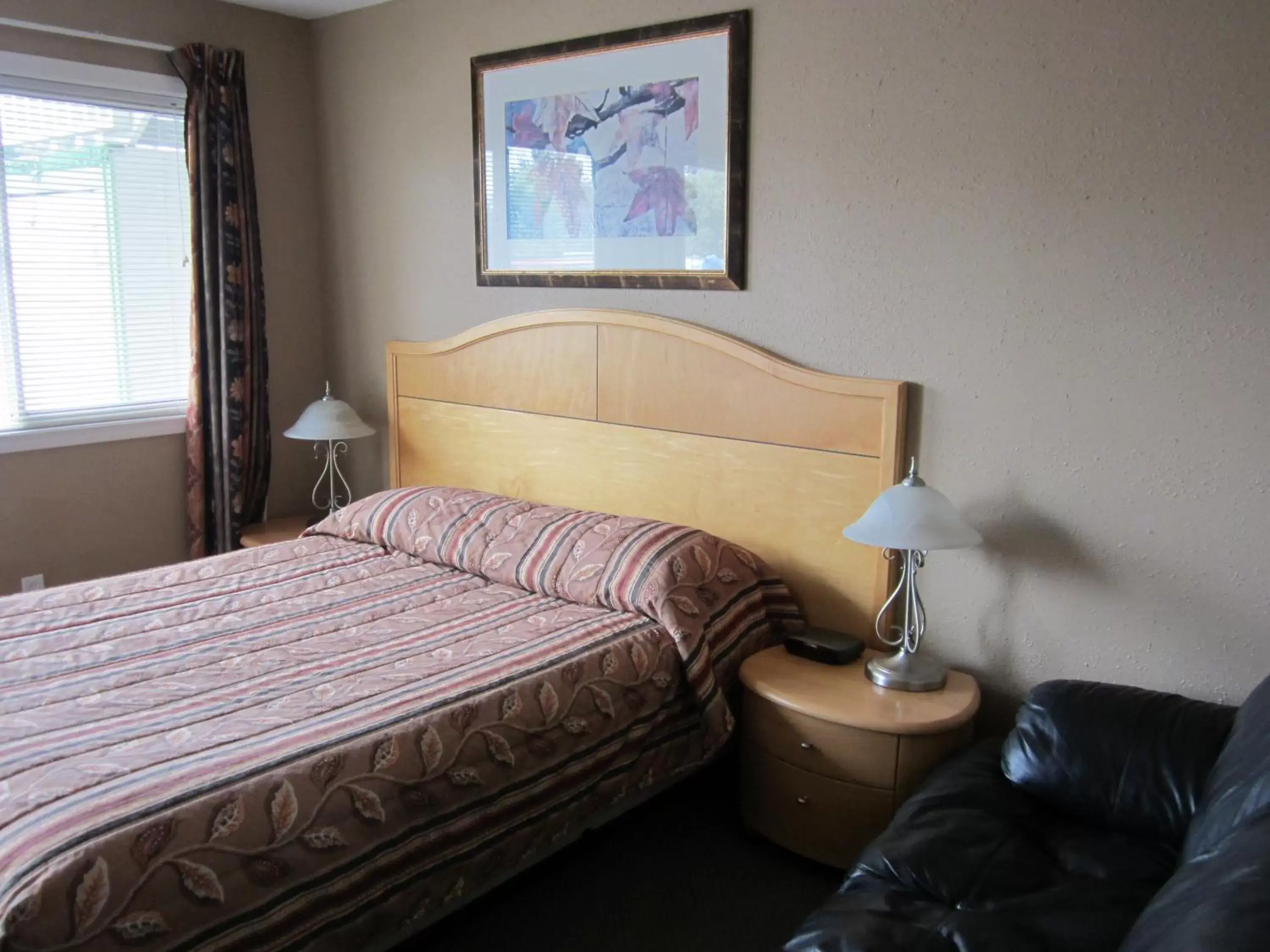 Bed in Bulkley Valley Motel