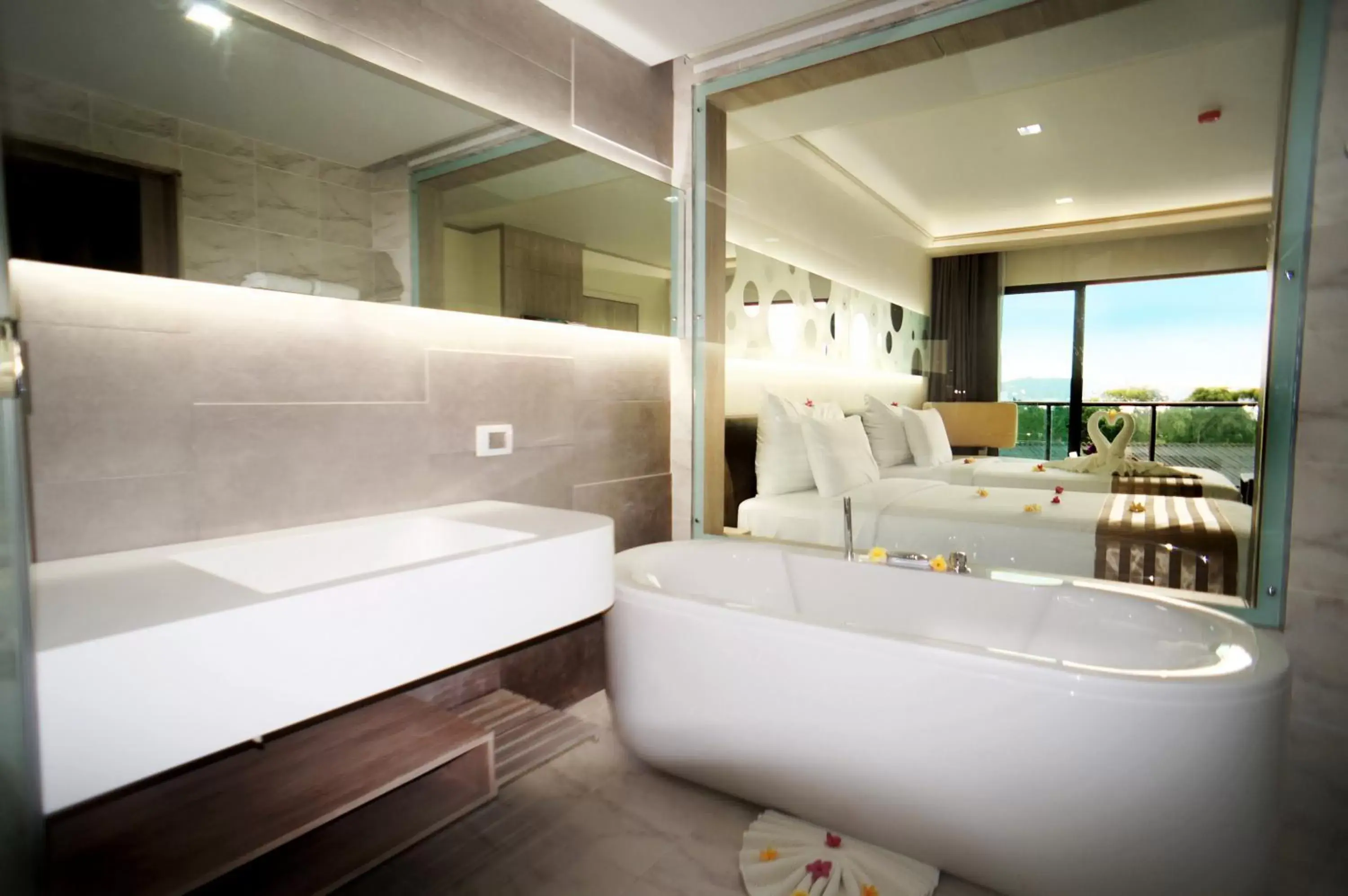 Bathroom in Pattaya Discovery Beach Hotel - SHA Extra Plus