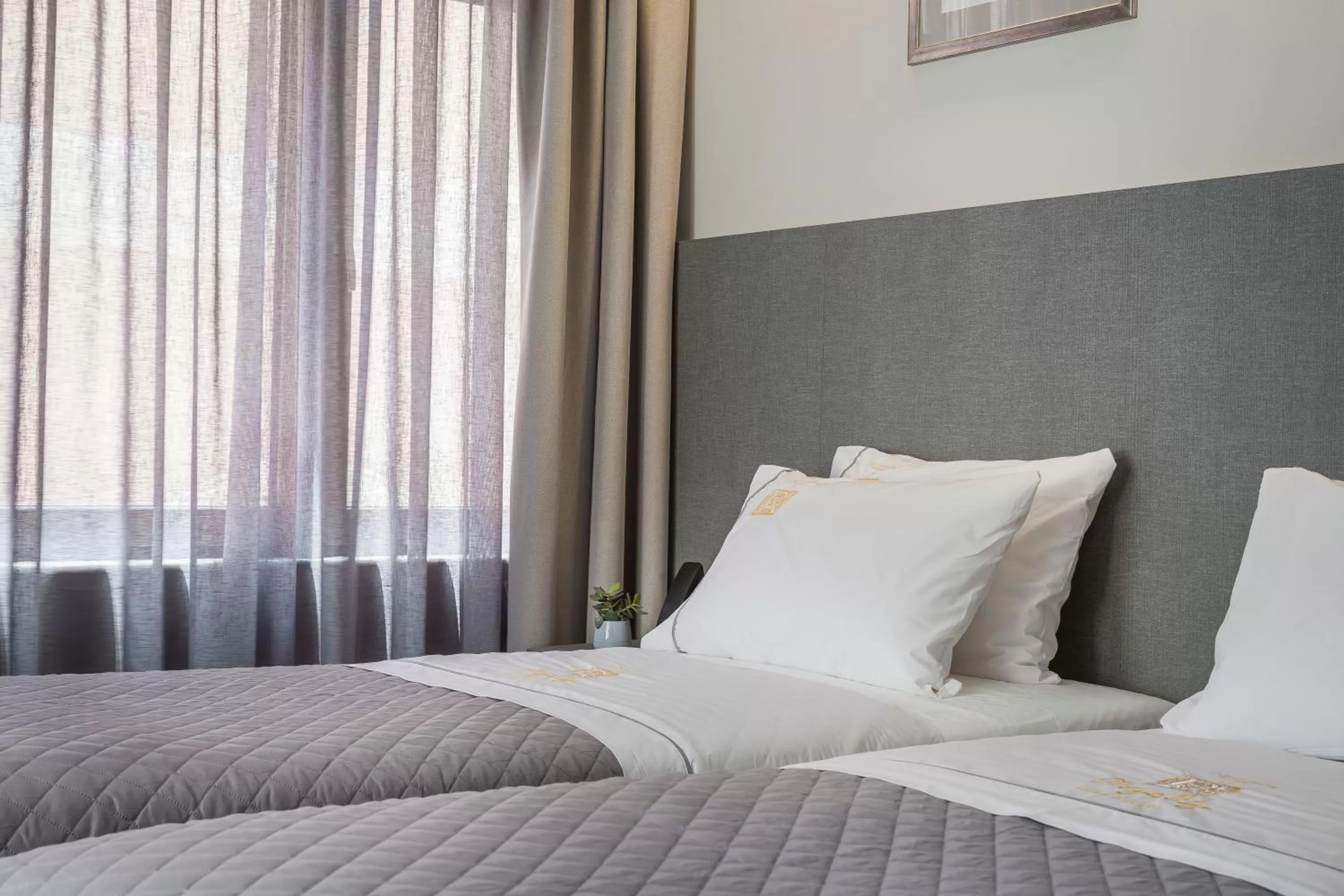 Bed in Royalty Hotel Athens