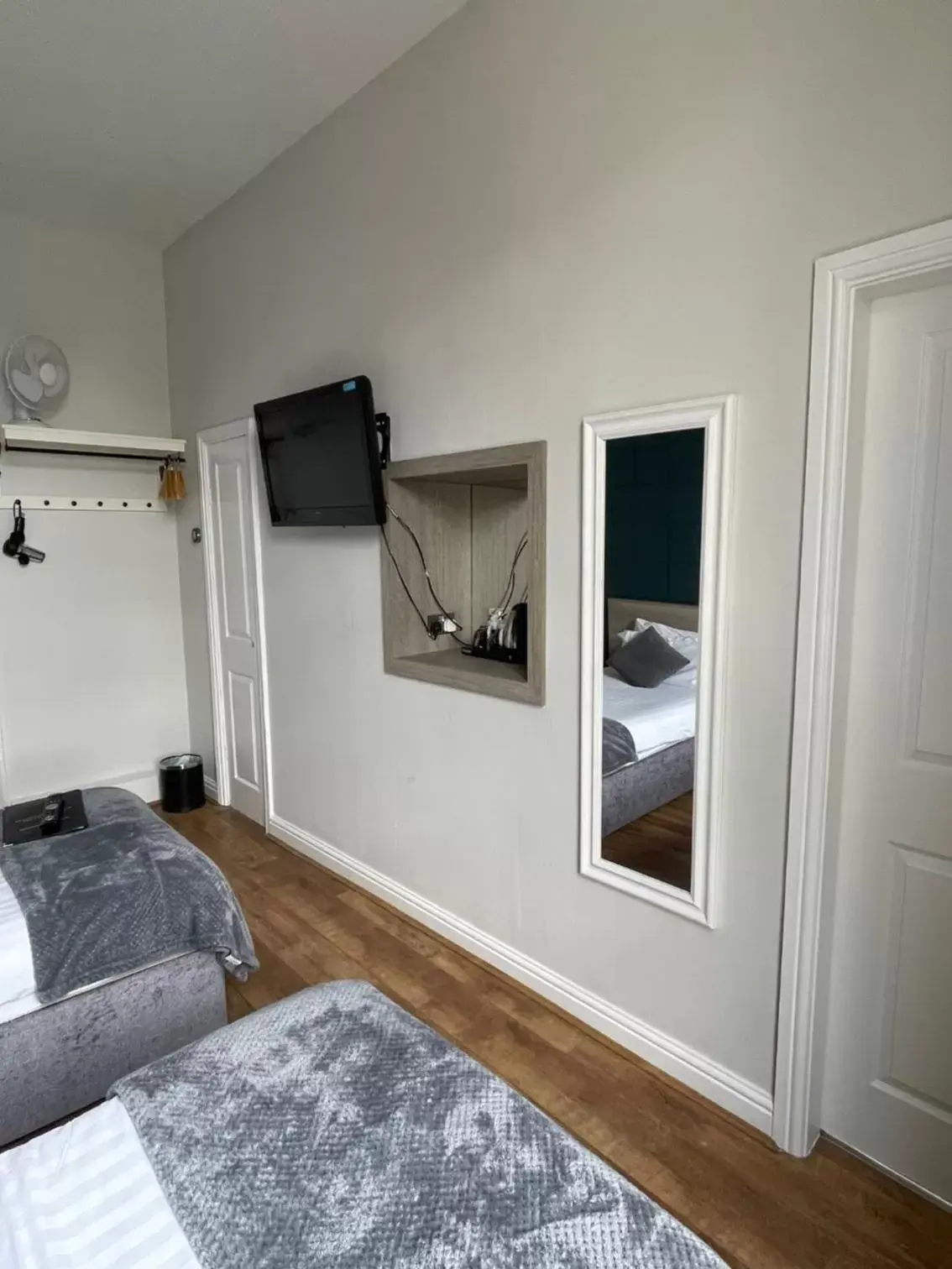 Bed, TV/Entertainment Center in The Whittington and Cat