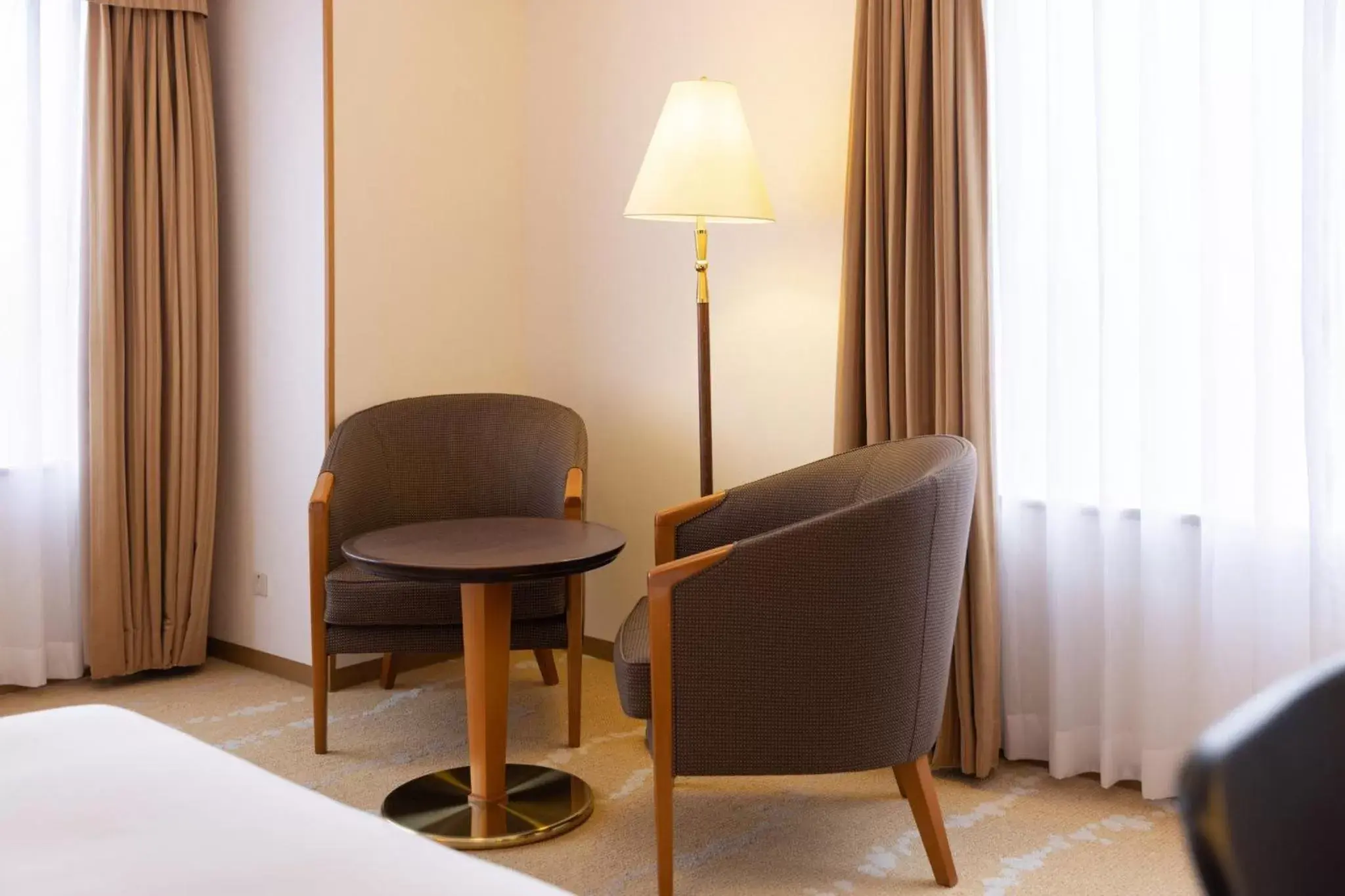 Photo of the whole room, Seating Area in ANA Crowne Plaza Toyama, an IHG Hotel