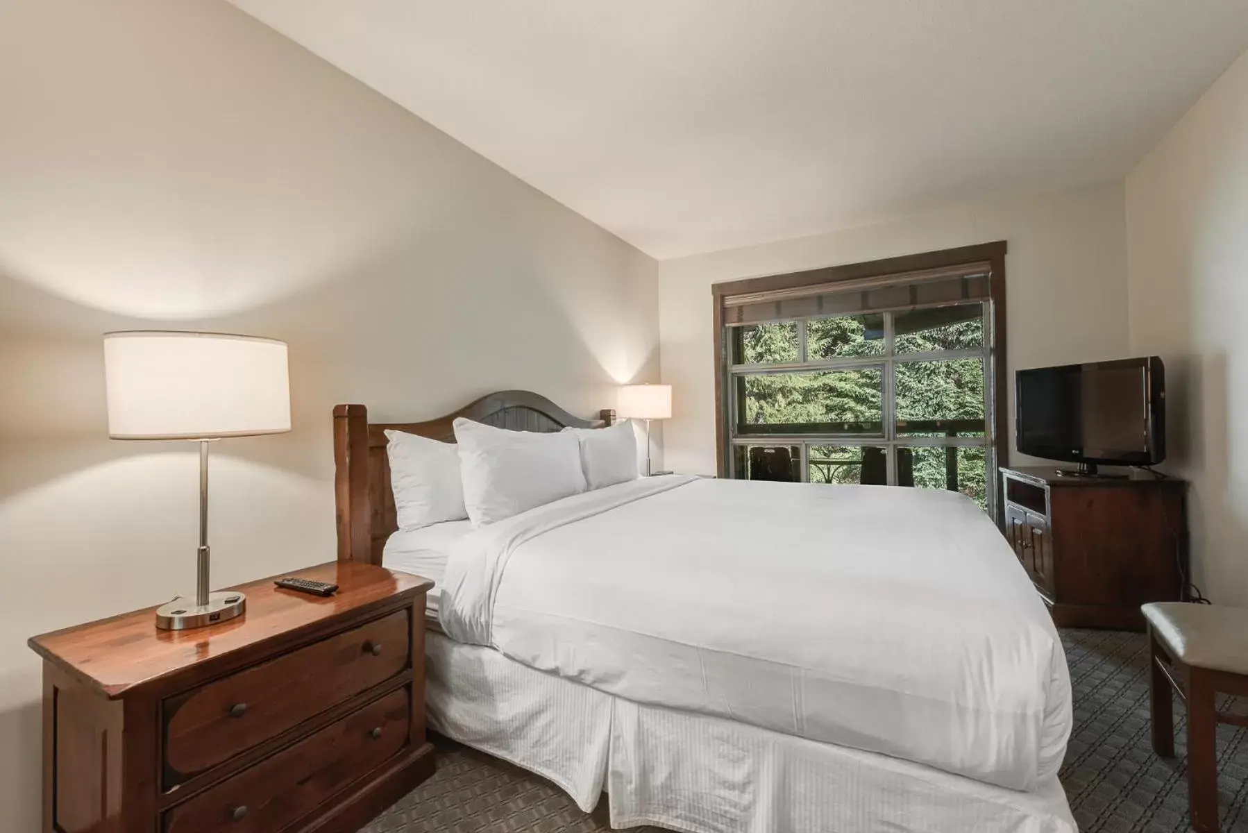 Bedroom, Bed in Blackcomb Springs Suites by CLIQUE
