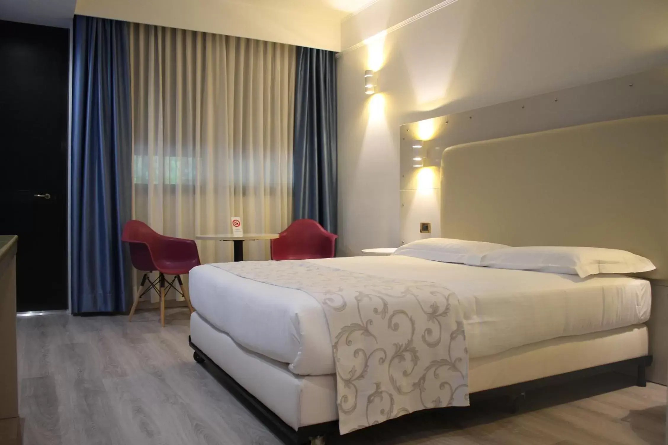 Decorative detail, Bed in Hotel Motel Visconteo
