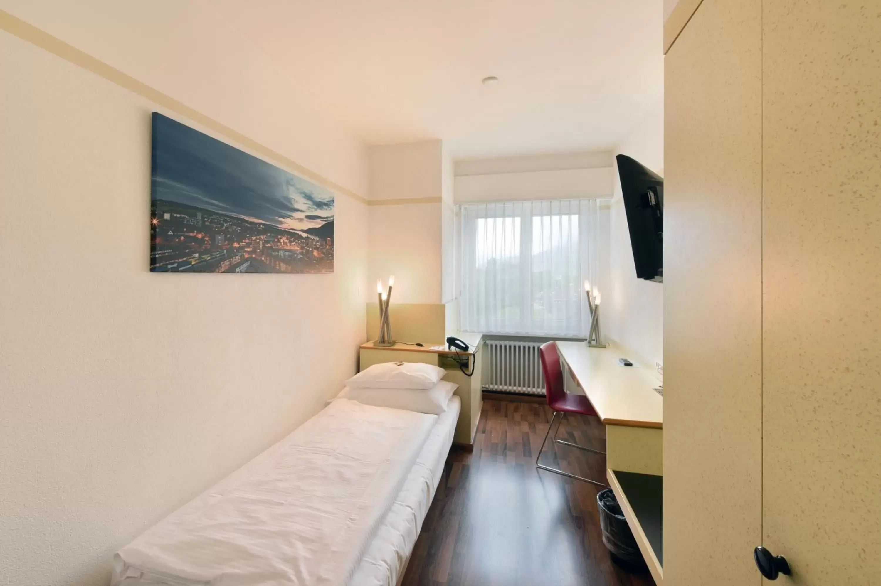 Photo of the whole room, Bed in City Hotel Biel Bienne Free Parking