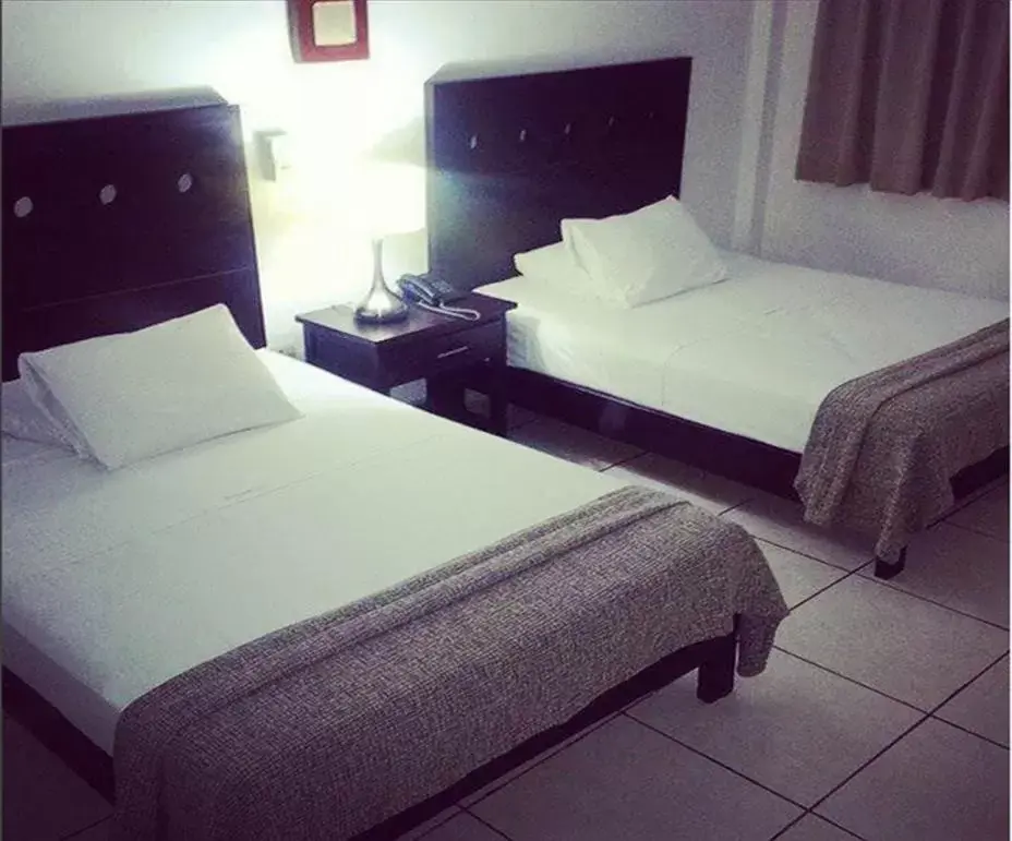 Bed in Hotel & Suites Mo Sak