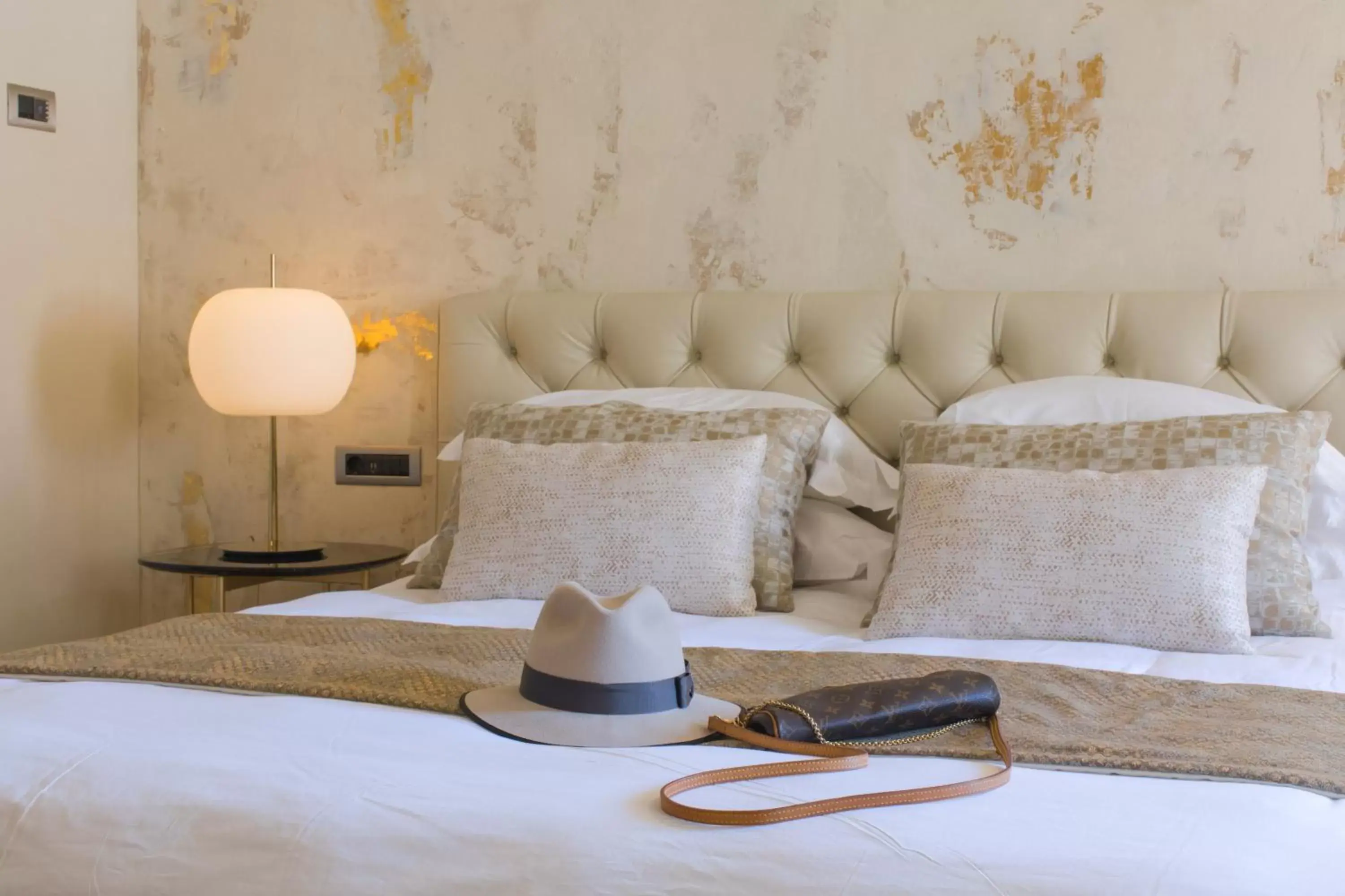 Bed in Castellano Hotel & Suites