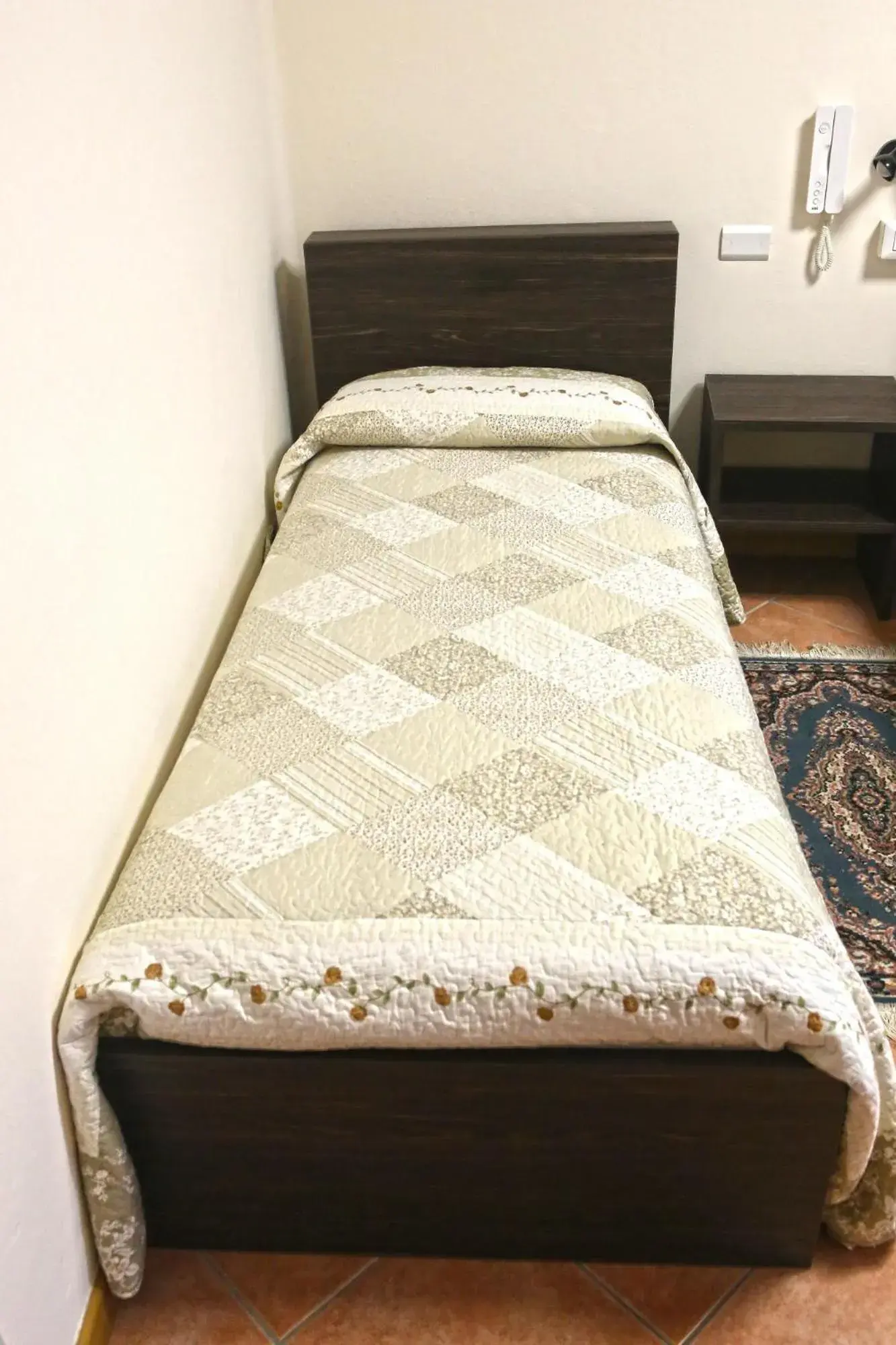 Bed in Albergo Gusmeroli
