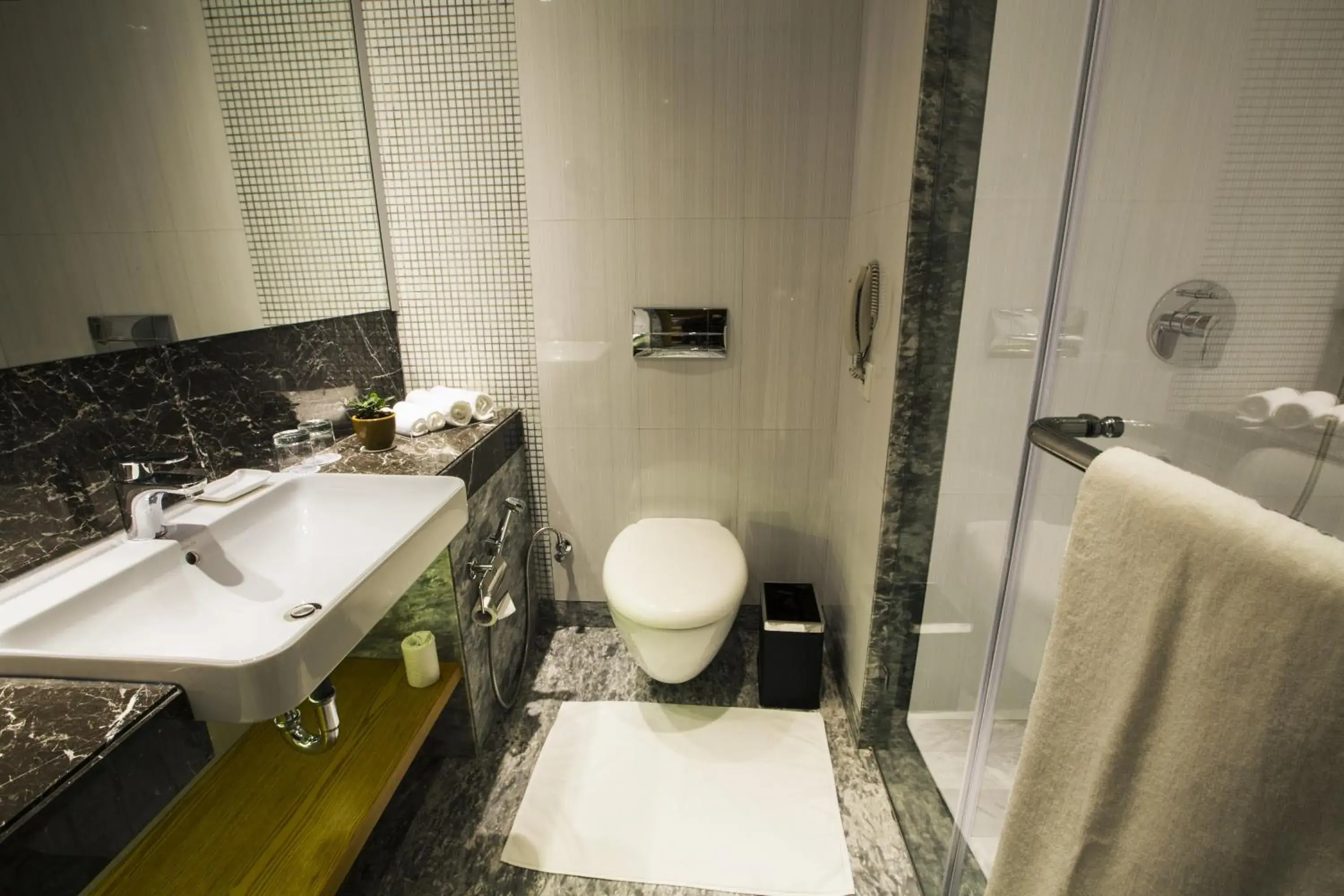 Bathroom in Golden Tulip Vasundhara Hotel and Suites