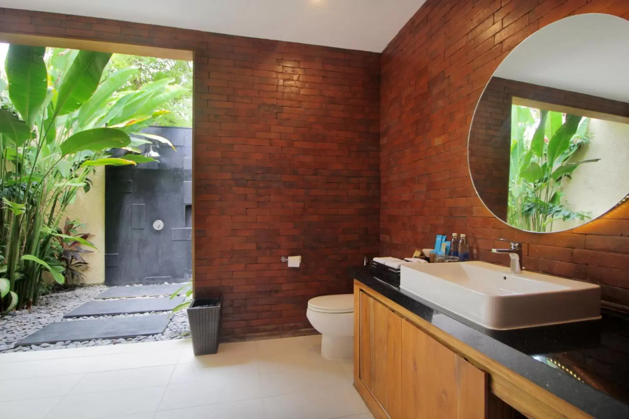 Bathroom in Sagara Villas and Suites Sanur by AHM Bathroom in Sagara Villas and Suites Sanur by AHM