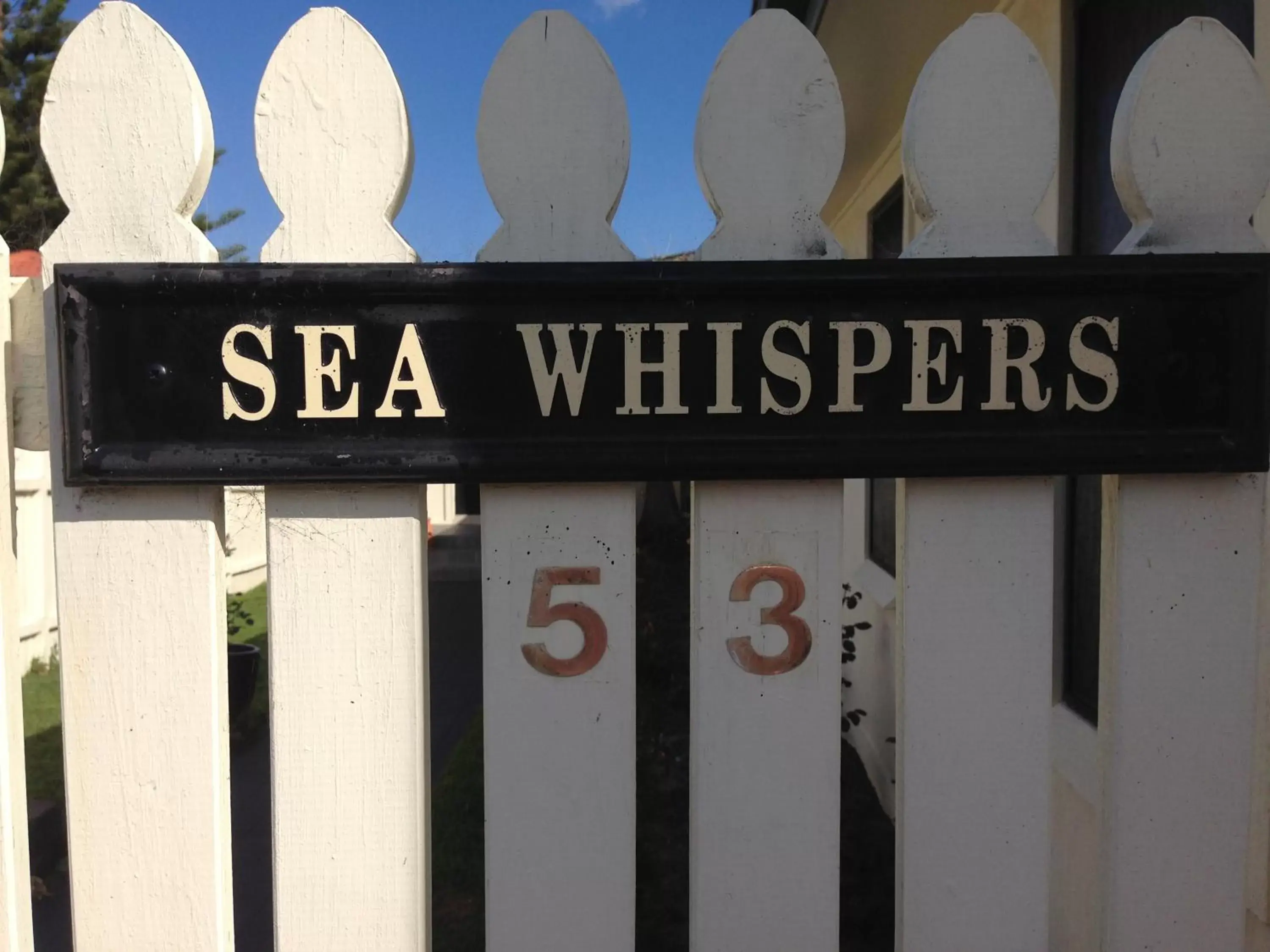 Property logo or sign in Sea Whispers
