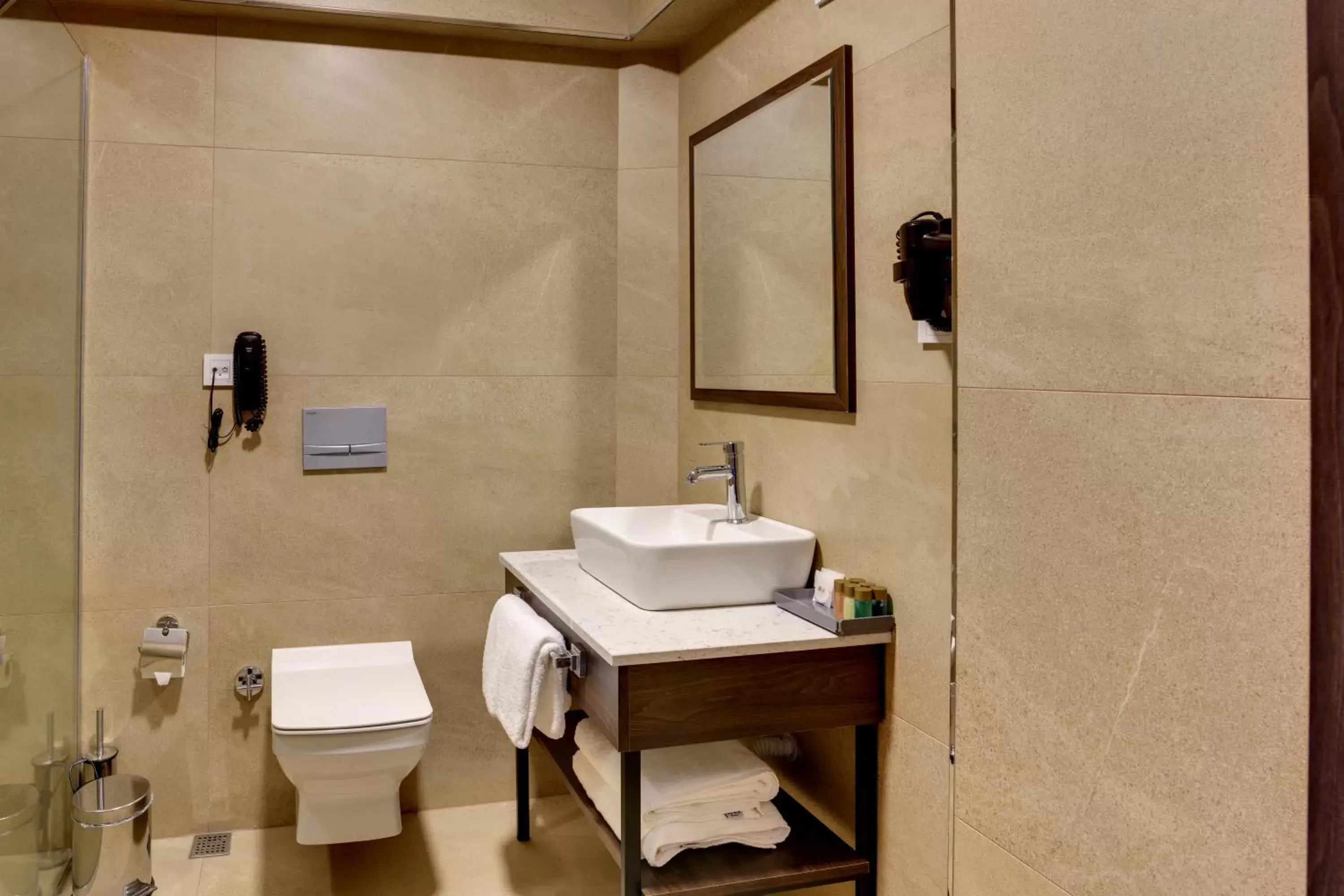 Toilet, Bathroom in Leo Suites