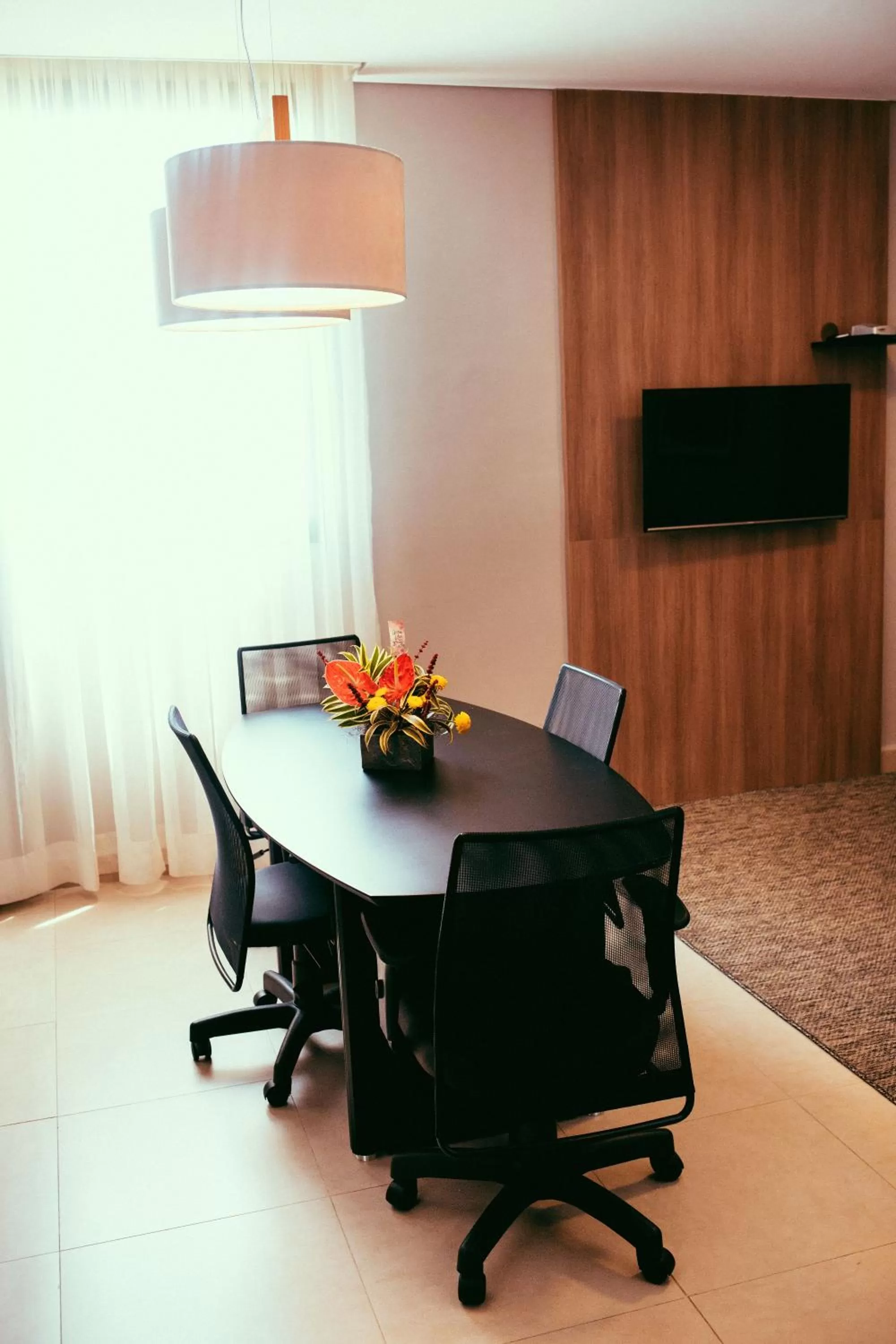 Communal lounge/ TV room in Occitano Apart Hotel