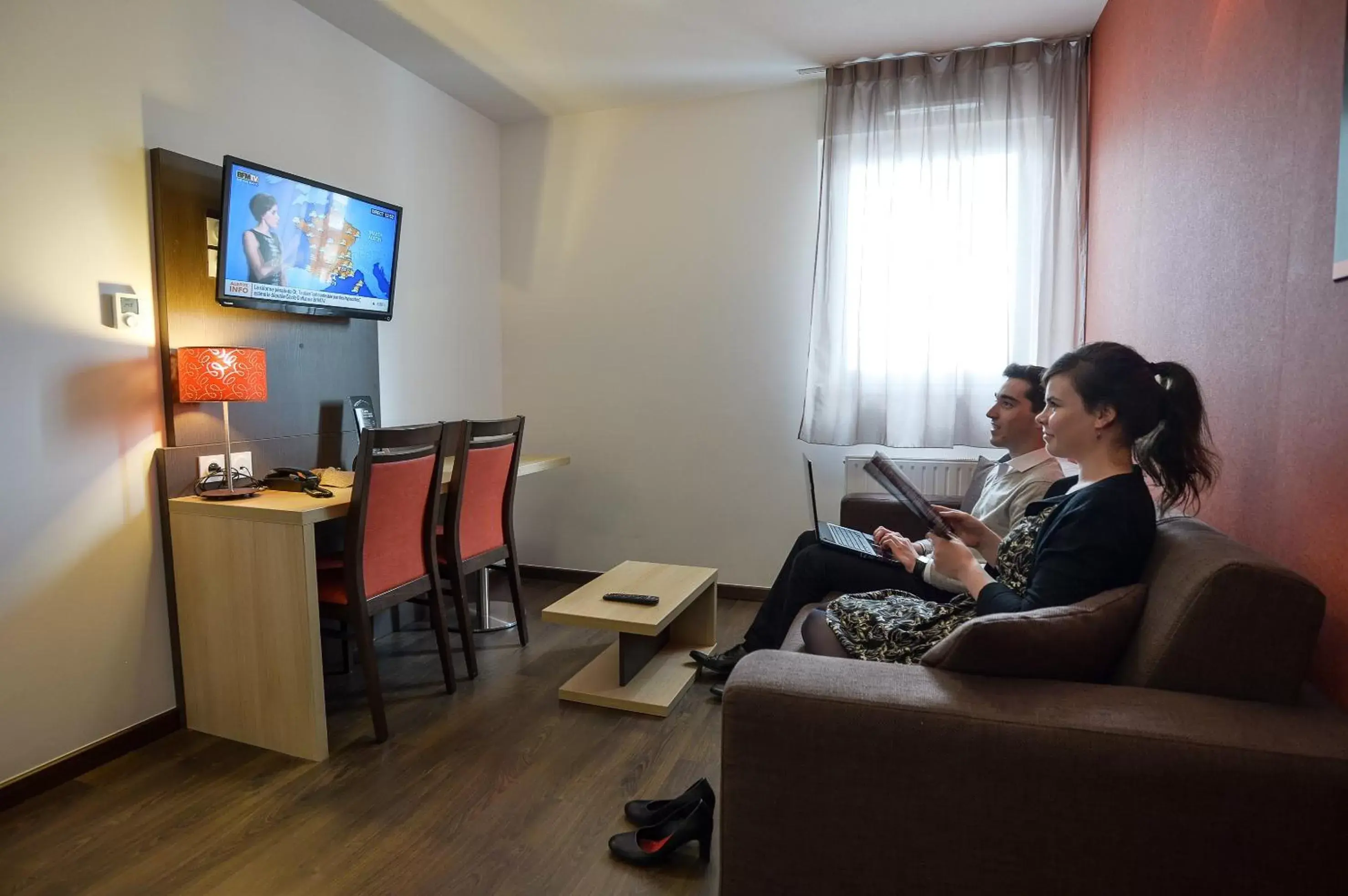 Family, TV/Entertainment Center in Apparthotel Privilodges Carré de Jaude