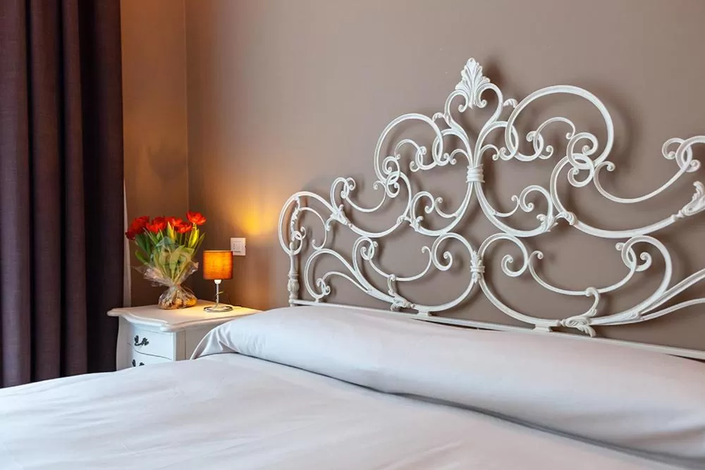 Bed in Art Hotel Ventaglio